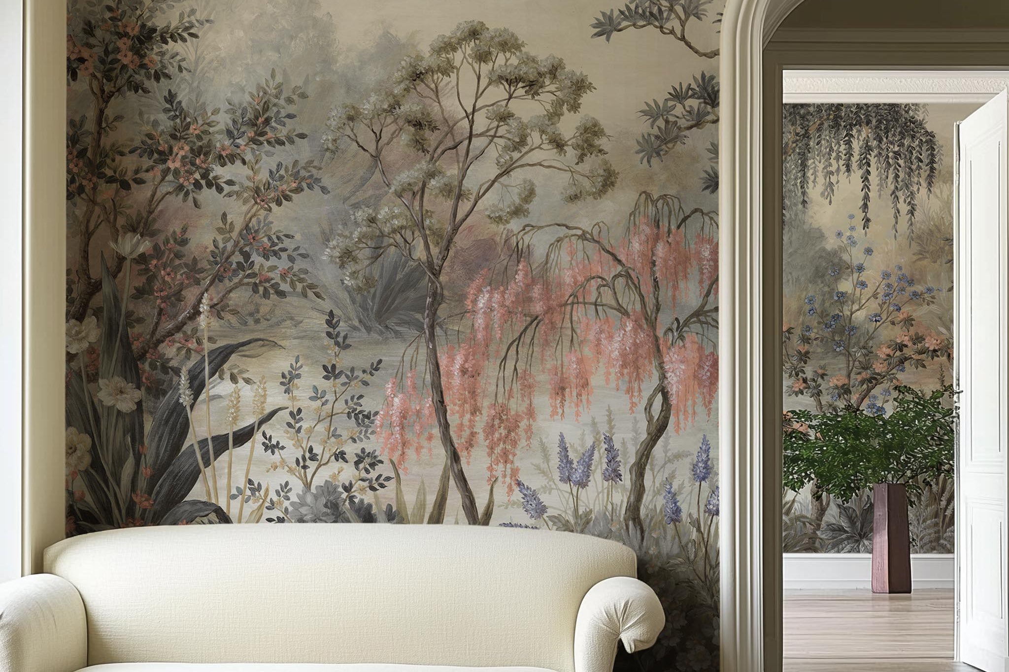 A cropped view of sitting area featuring a panoramic matte wallpaper mural of a lakeside scene in vintage tones.