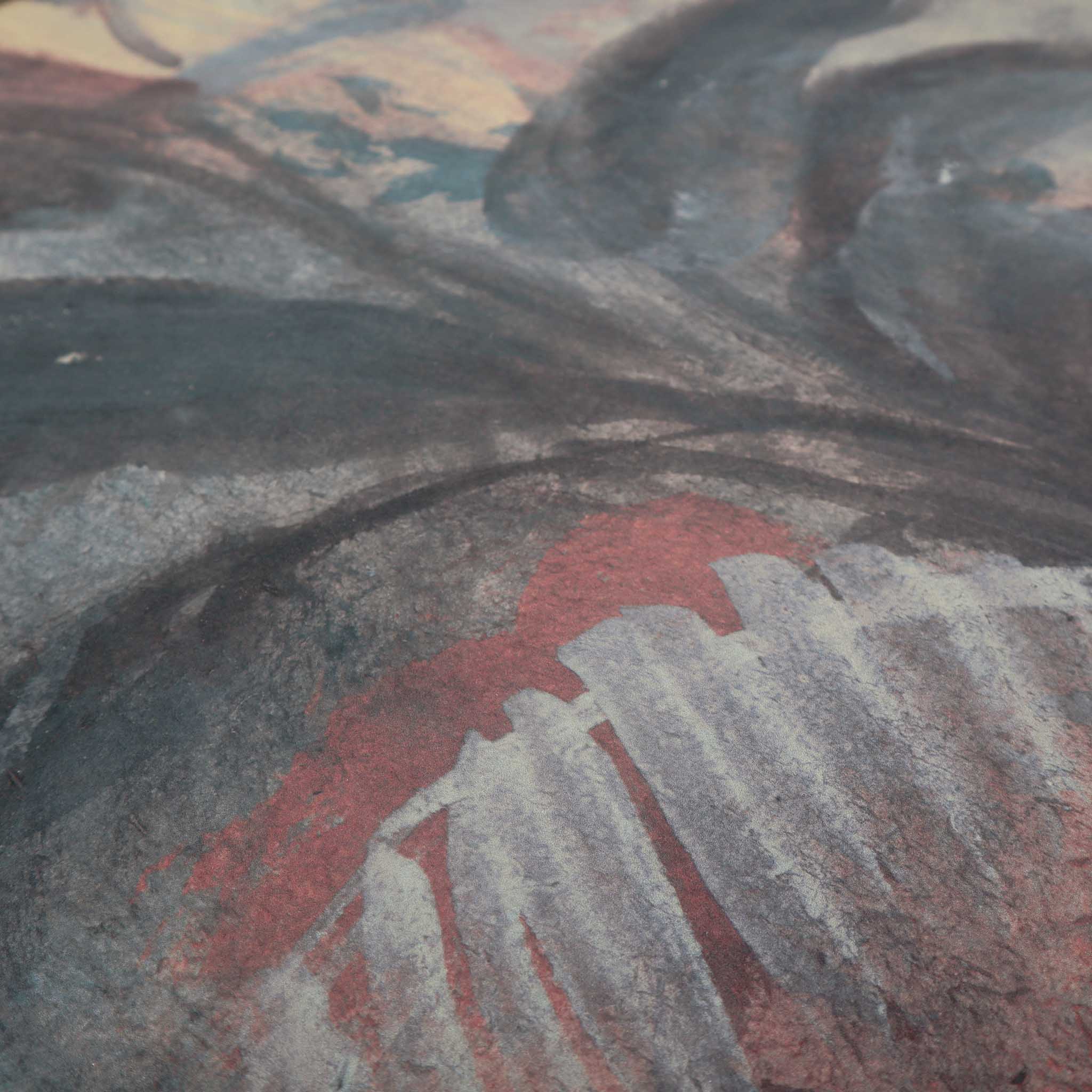 Close-up of a textured hand-painted mural featuring soft greys, dusty blues, and earth tones in an abstract style.