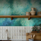 A cropped view of kitchen featuring a panoramic vinyl wallpaper mural of an abstract wash in aqua and jade.