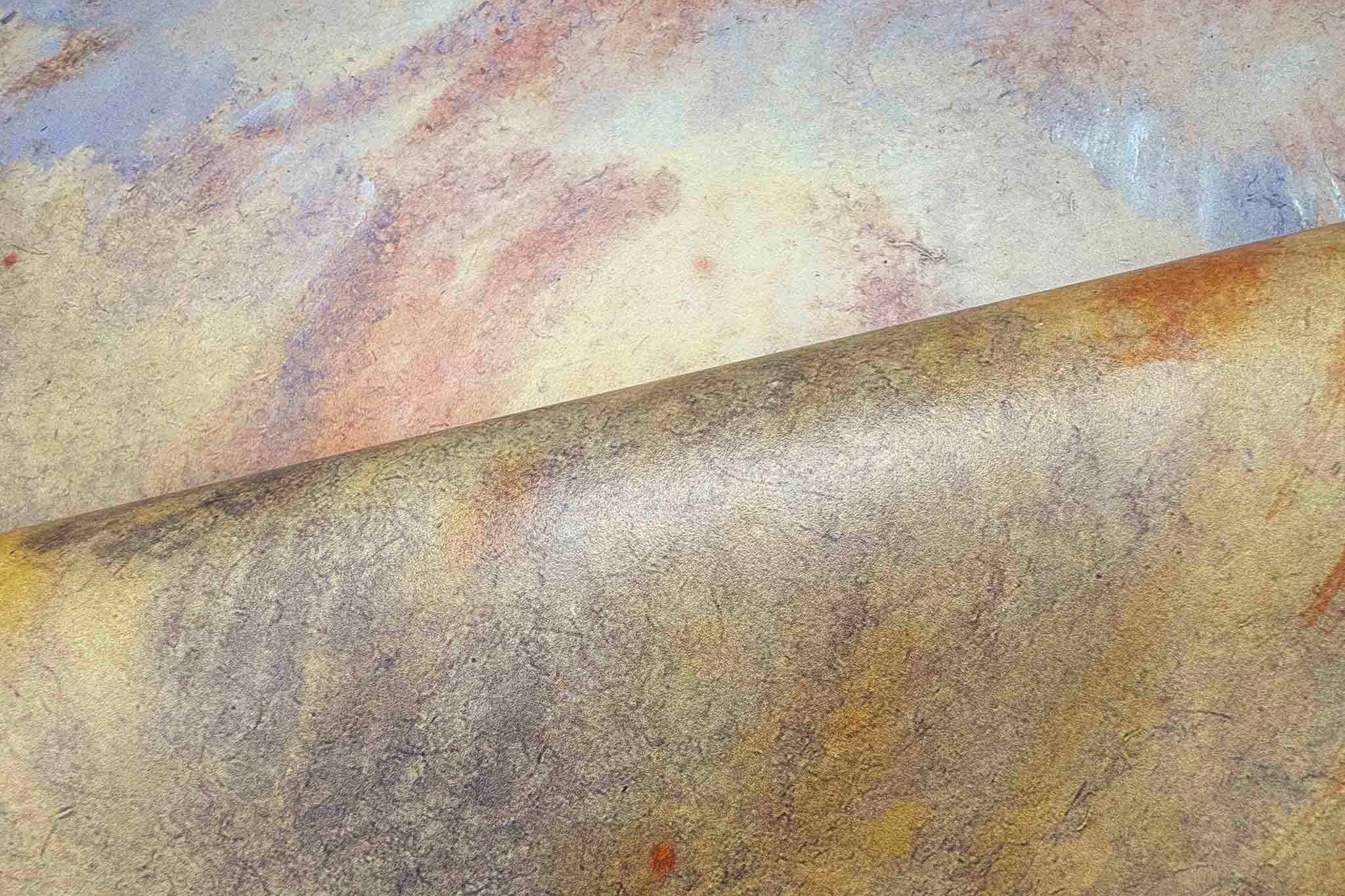 Close-up of a hand-painted panoramic wallpaper mural featuring rich tones of charcoal, rust, and ochre printed on vinyl.