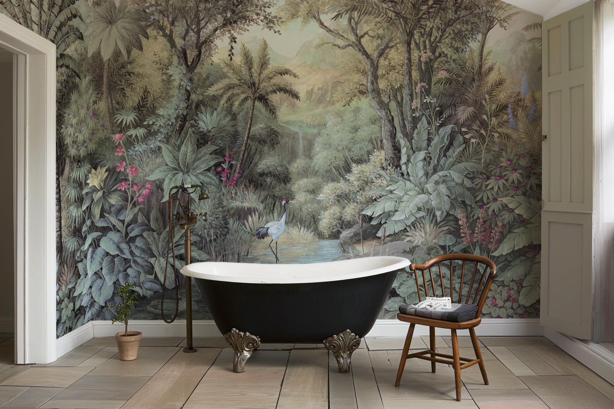 An interior bathroom featuring a panoramic vinyl wallpaper mural of a tropical paradise in cool greens and blushes.