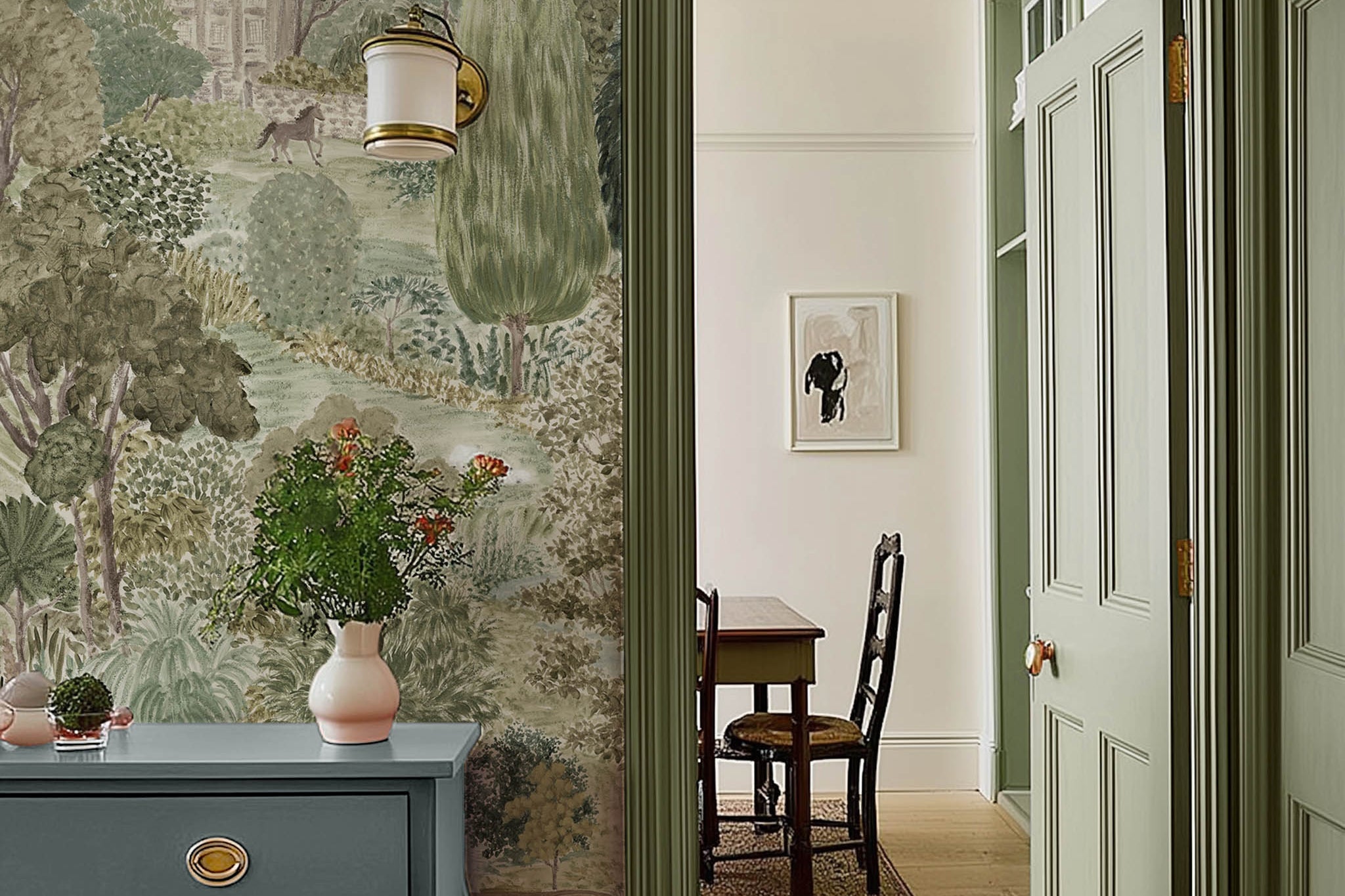 An interior hallway featuring a panoramic matte wallpaper mural of soft green countryside with cattle and boats