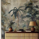 A cropped view of hallway featuring a panoramic matte wallpaper mural of a tropical scene in sage and parchment.
