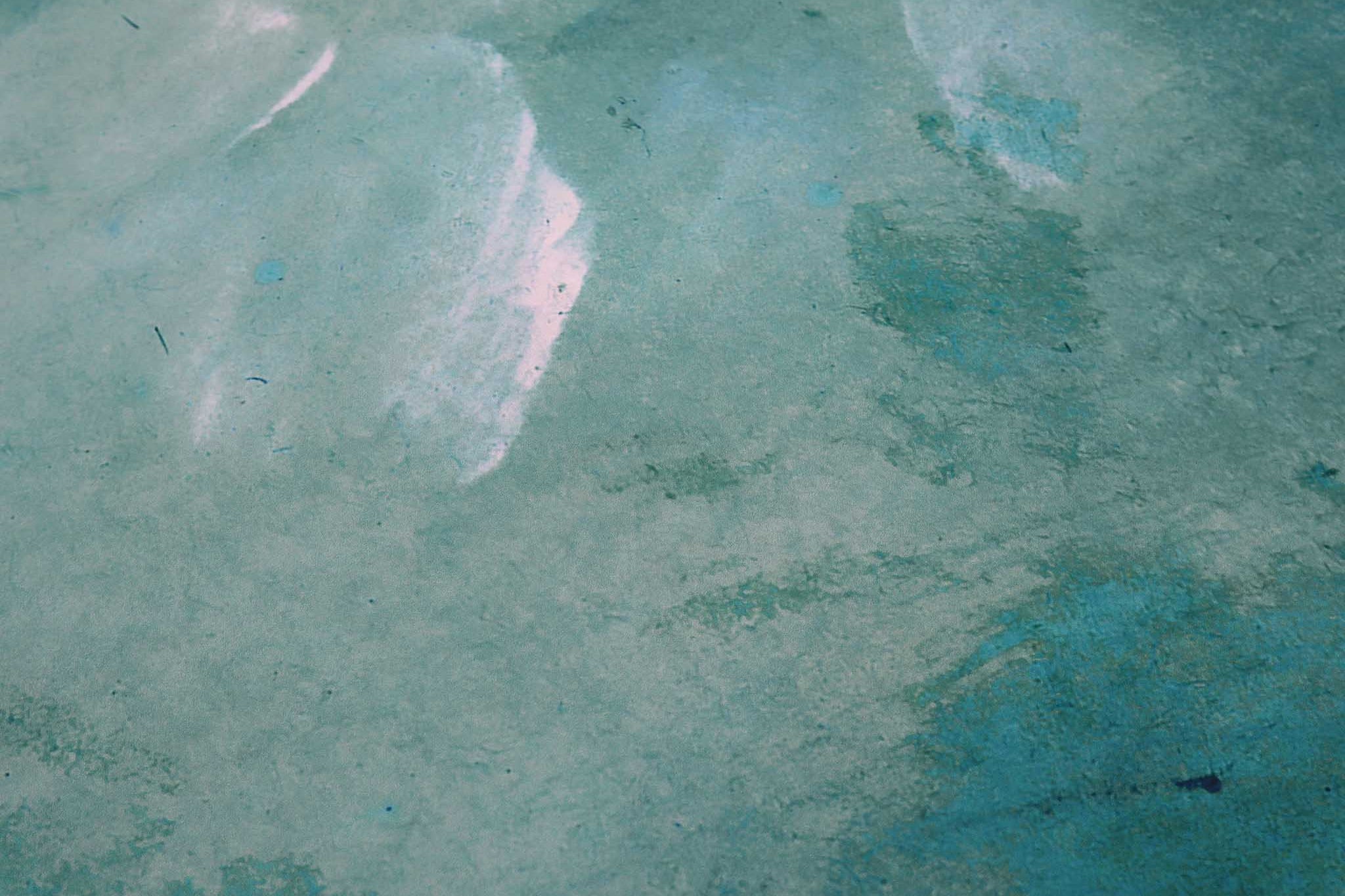Close-up of hand-painted abstract wallpaper mural with lush aqua, teal, and turquoise tones on matte uncoated substrate.