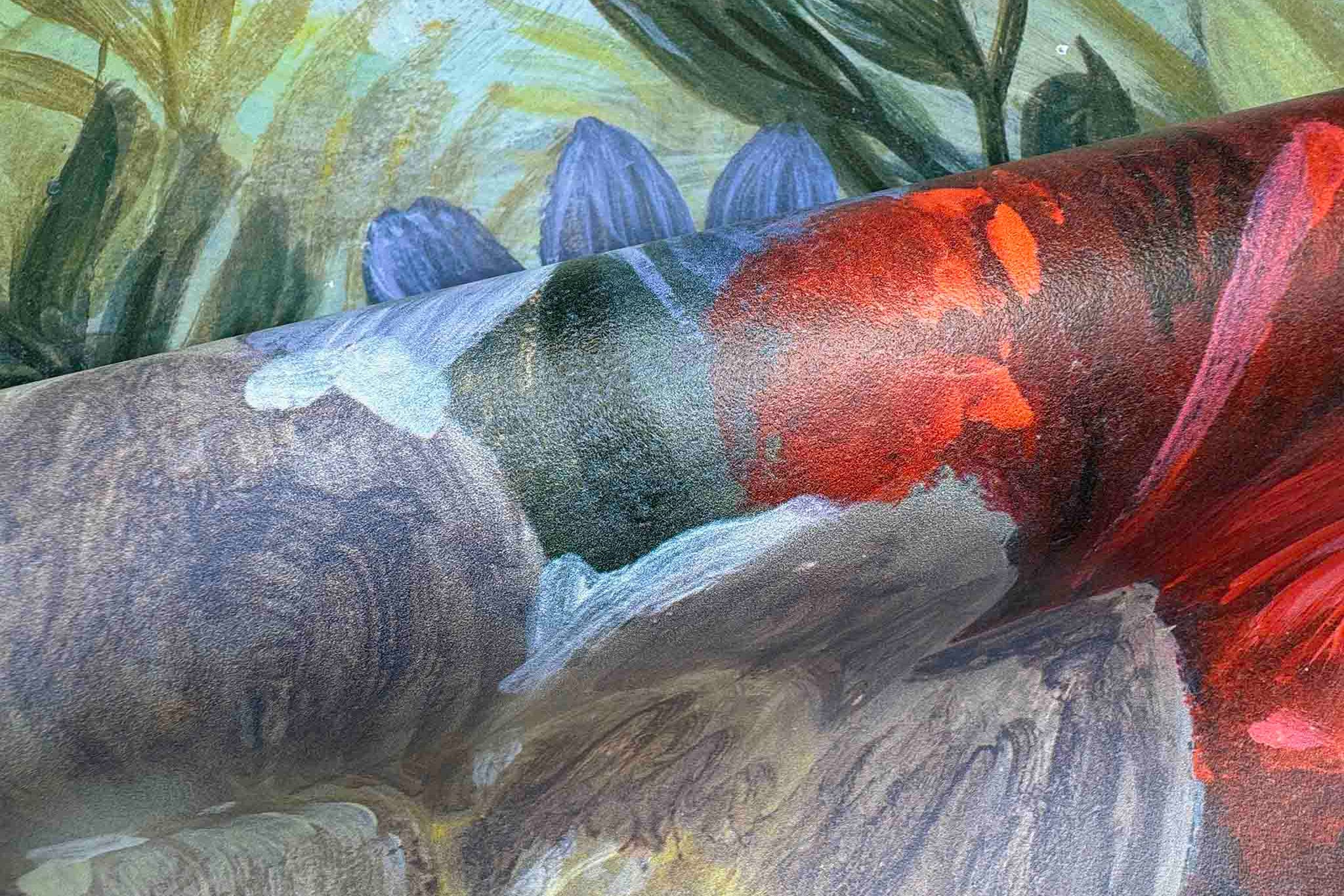 Close-up of a bespoke floral mural wallpaper featuring vibrant greens, reds, purples, and soft pinks on washable vinyl.
