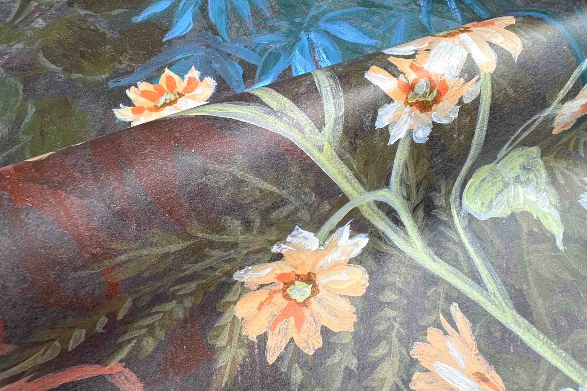 Close-up of a bespoke designer wallpaper mural featuring floral motifs in deep blues and earthy tones on premier vinyl.