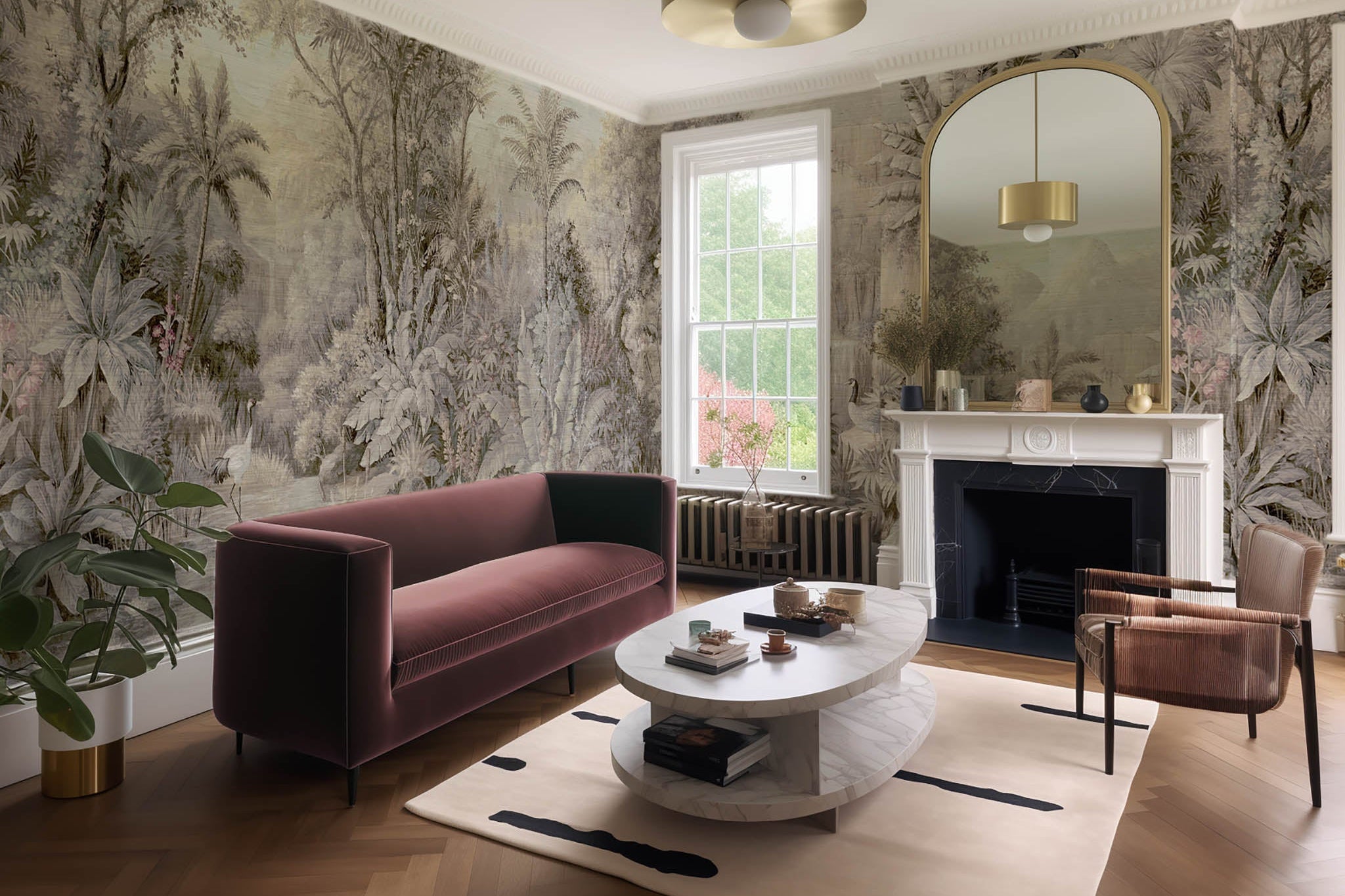 An interior living room featuring a panoramic grasscloth wallpaper mural of a jungle vista in sepia and blush.