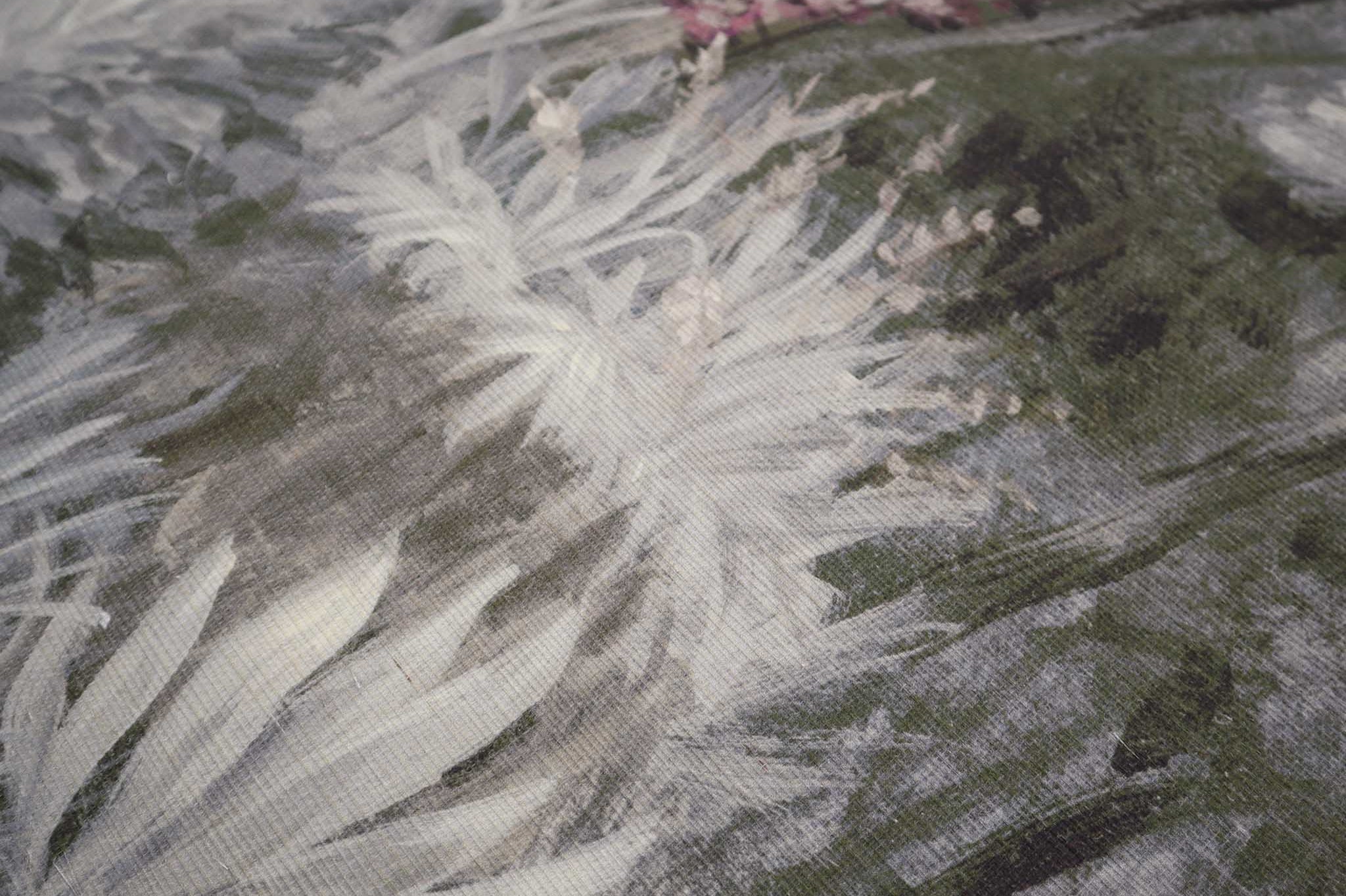 Close-up of a hand-painted floral panoramic wallpaper mural on textured grasscloth, featuring soft ecru and grey tones.