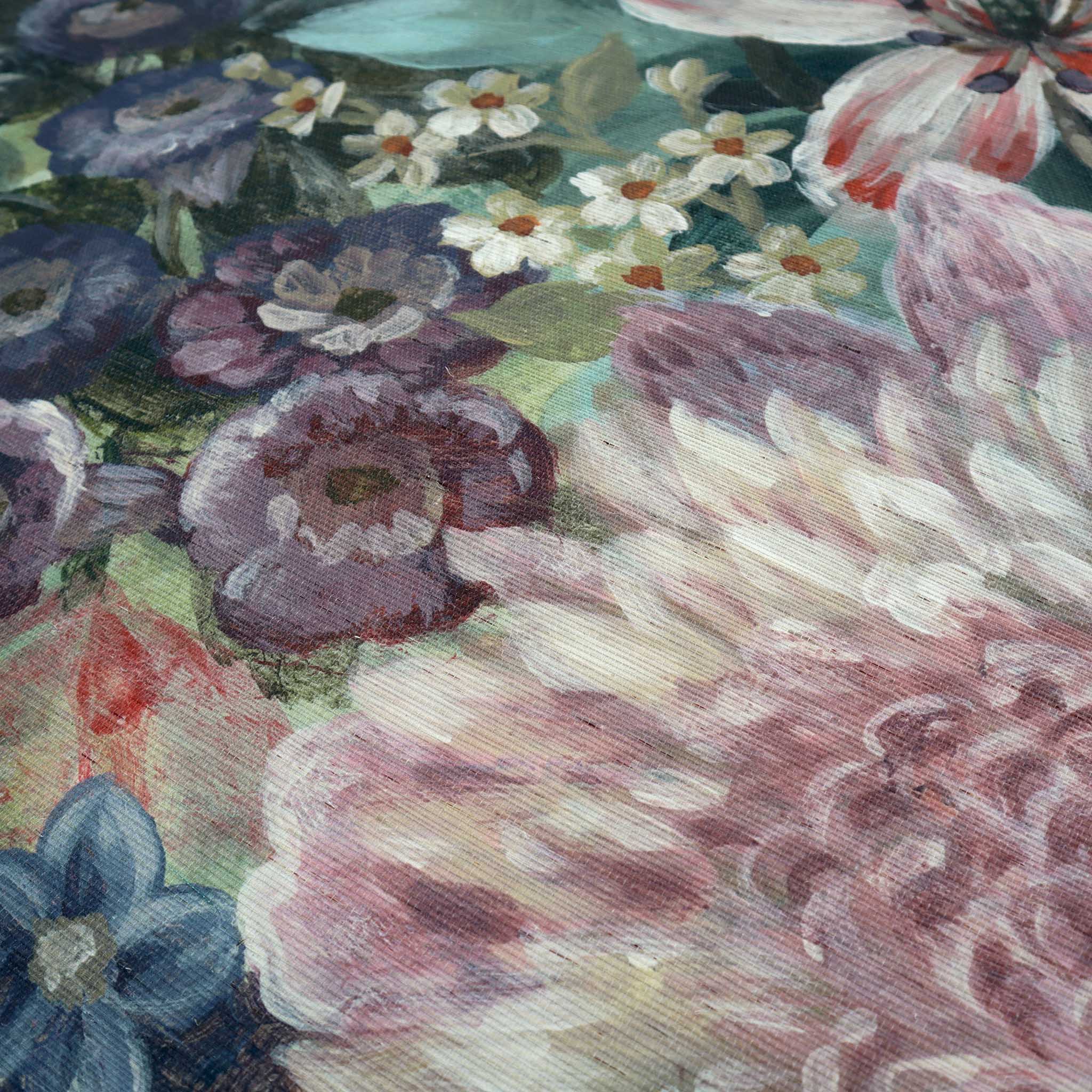 Close-up of a vibrant floral mural on grasscloth, featuring rich greens, reds, purples, and soft pinks.