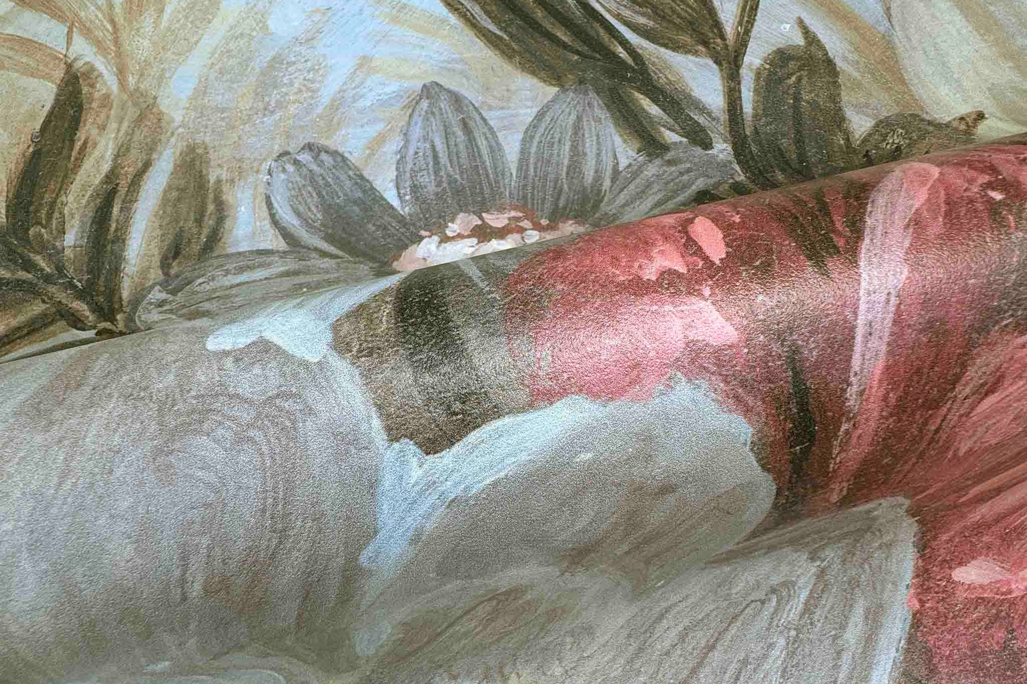 Close-up of a bespoke floral wallpaper mural, featuring soft blush pinks and creamy whites printed on durable vinyl.