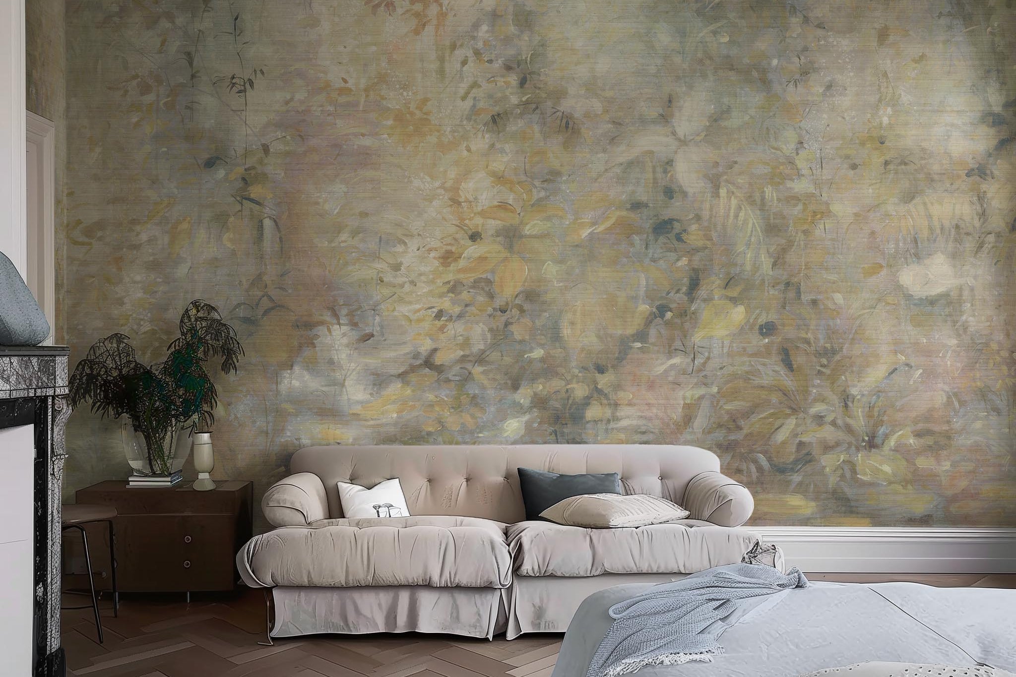 An interior living room featuring a panoramic grasscloth wallpaper mural of an abstract forest in lemon and cream.