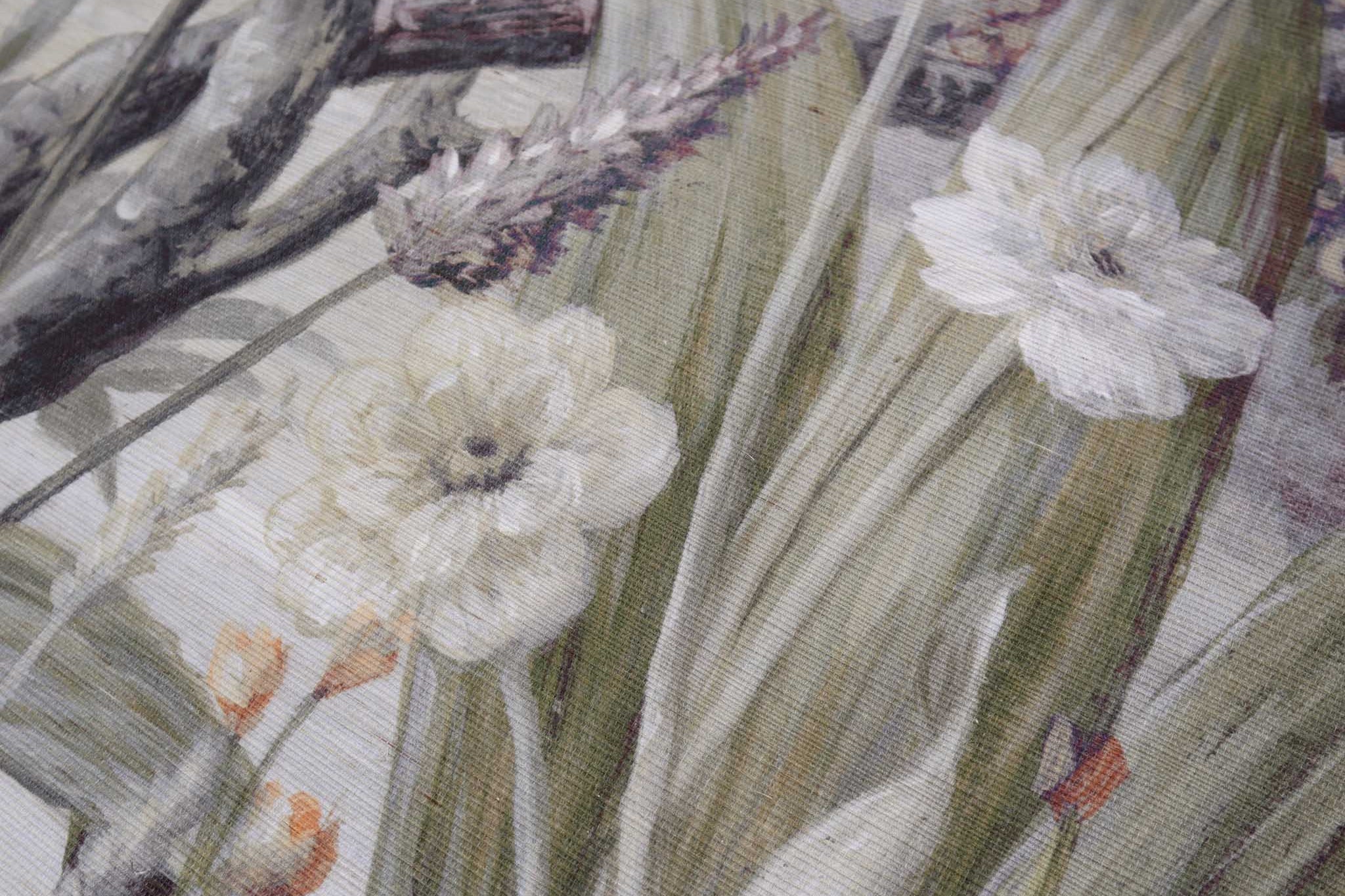 Close-up of a hand-painted grasscloth wallpaper mural with subtle tones of white, green, and pink evoking chinoiserie.