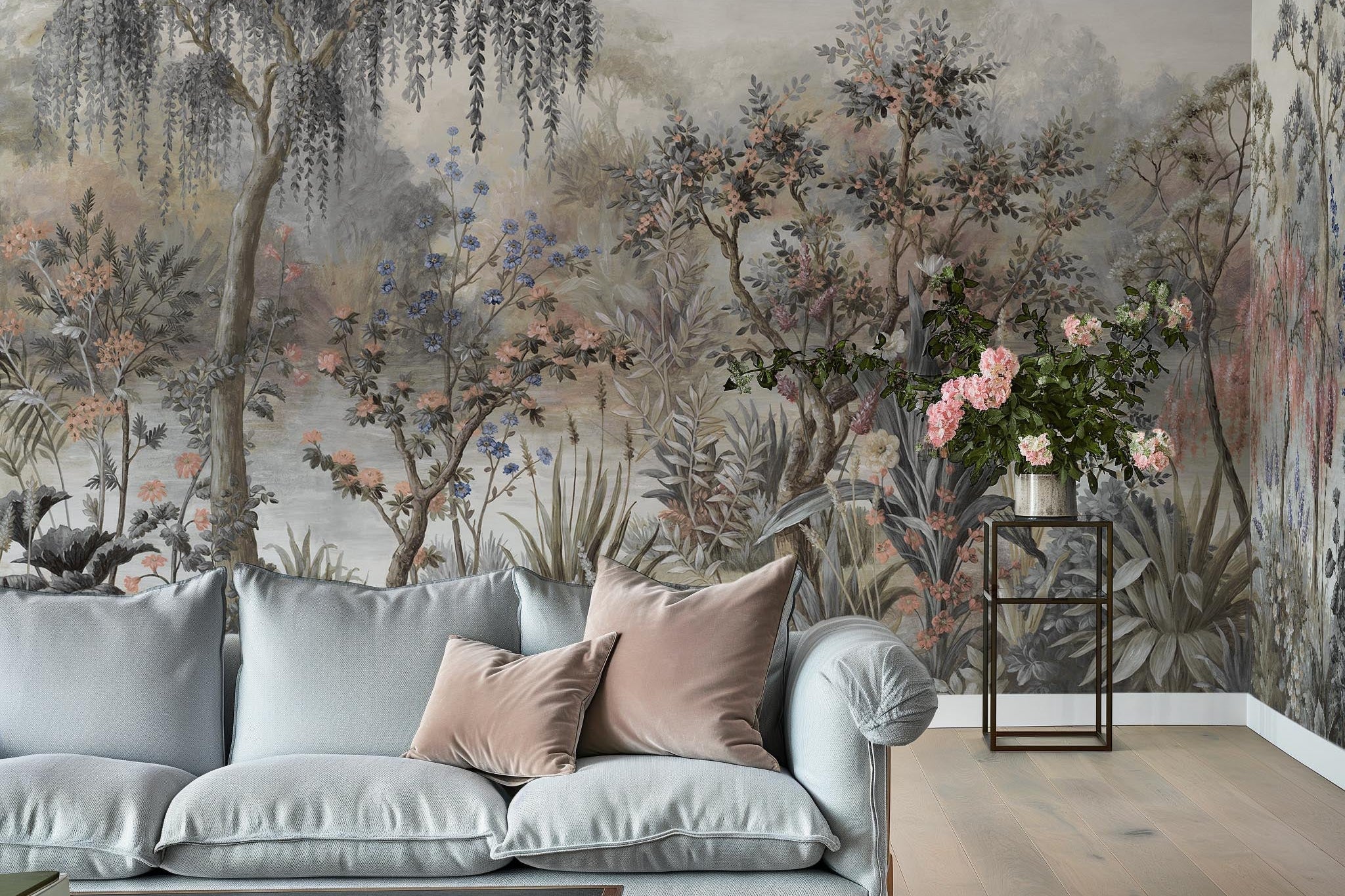 An interior living room featuring a panoramic vinyl wallpaper mural of a lakeside scene in vintage tones.