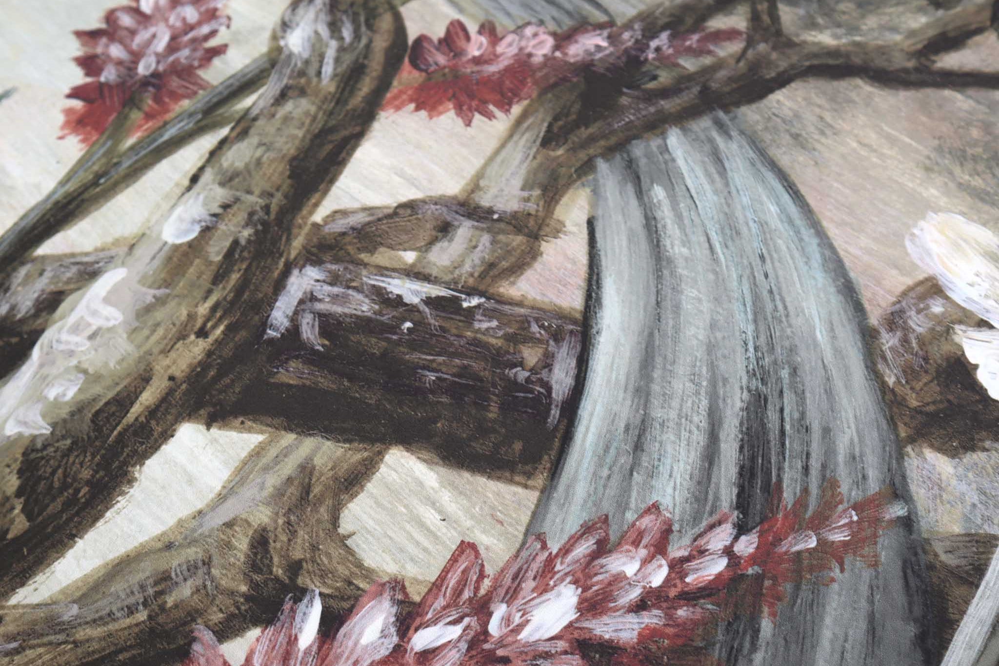 Close-up of a vintage-inspired chinoiserie mural featuring floral elements in soft greys, warm peach and muted blues.