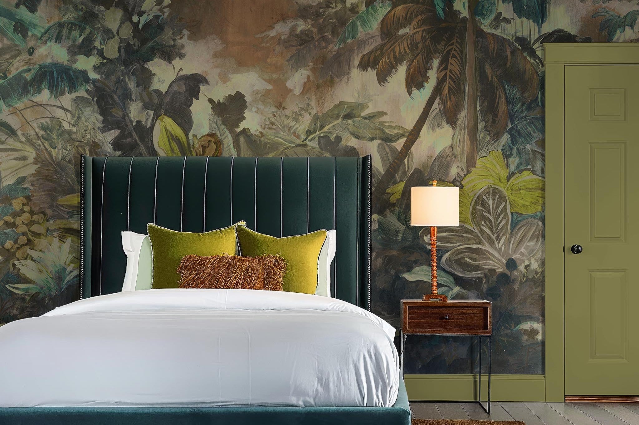 An interior bedroom featuring a panoramic matte wallpaper mural of a moody jungle in teal and ochre.
