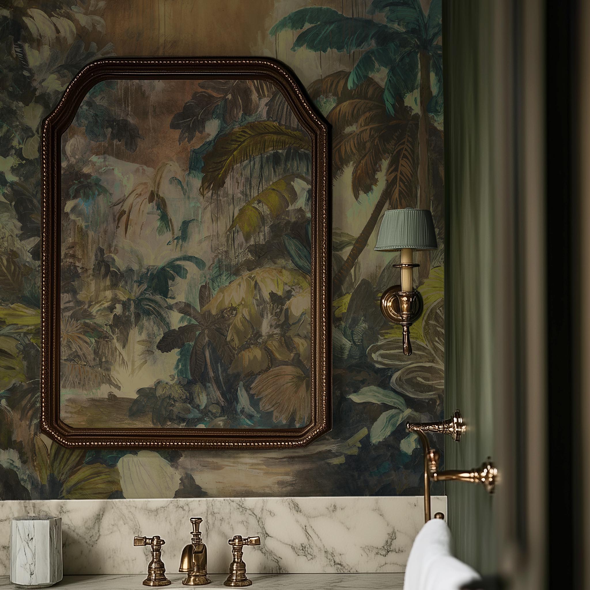 A cropped view of bathroom featuring a panoramic vinyl wallpaper mural of a moody jungle in teal and ochre.