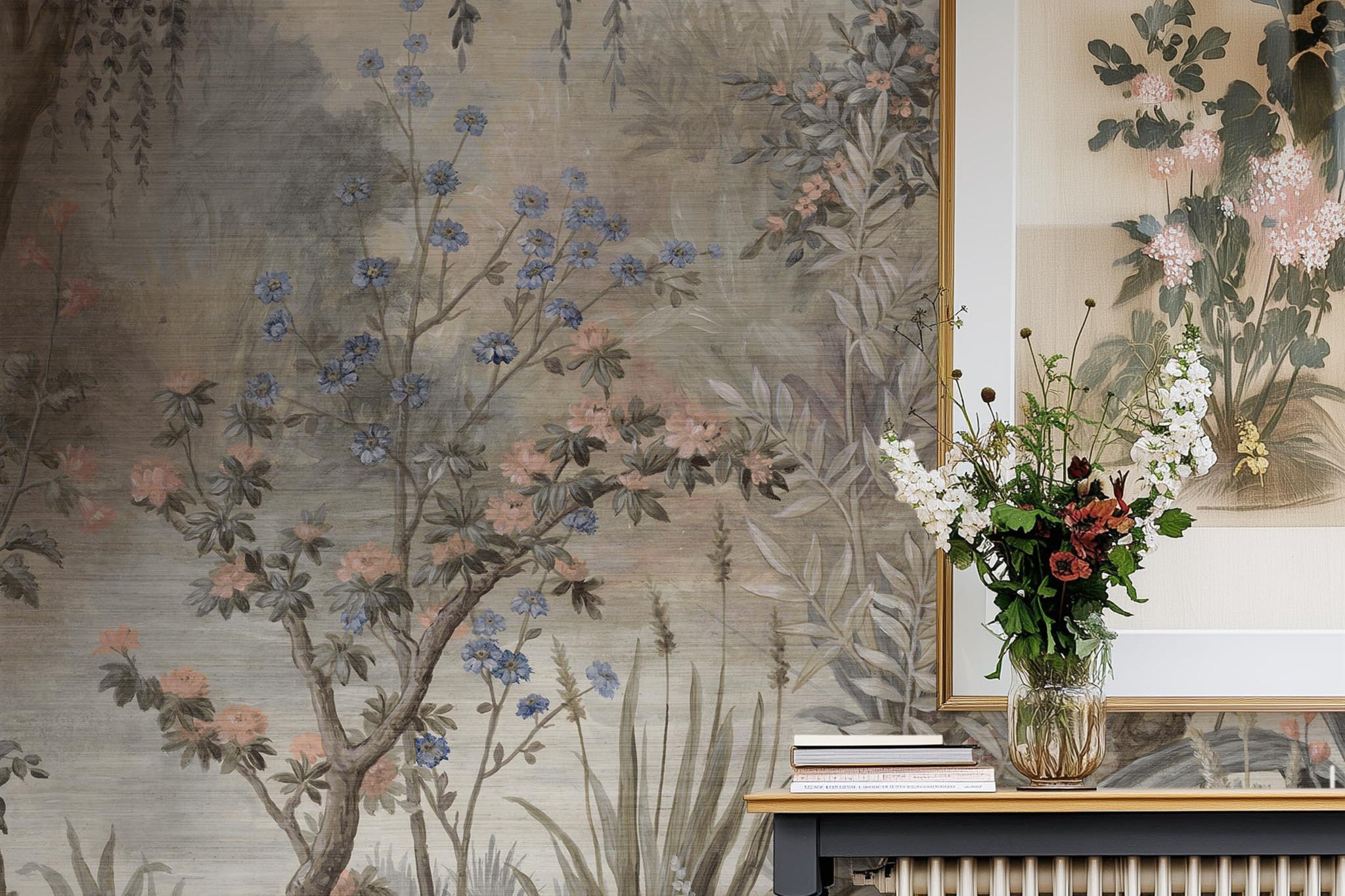A cropped view of hallway featuring a panoramic grasscloth wallpaper mural of a lakeside scene in vintage tones.