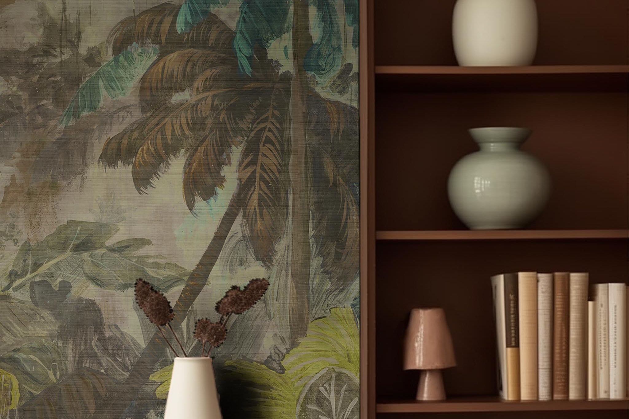 A cropped view of living room featuring a panoramic grasscloth wallpaper mural of a moody jungle in teal and ochre.