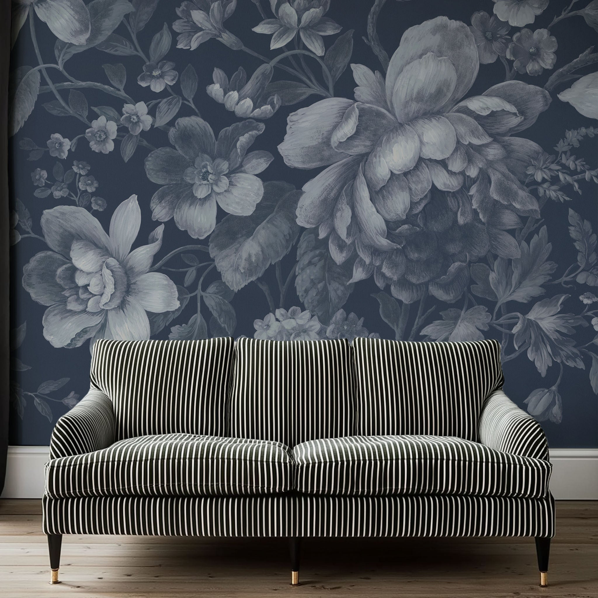 An interiorliving room featuring a panoramic matte wallpaper mural of moonlit florals on deep navy