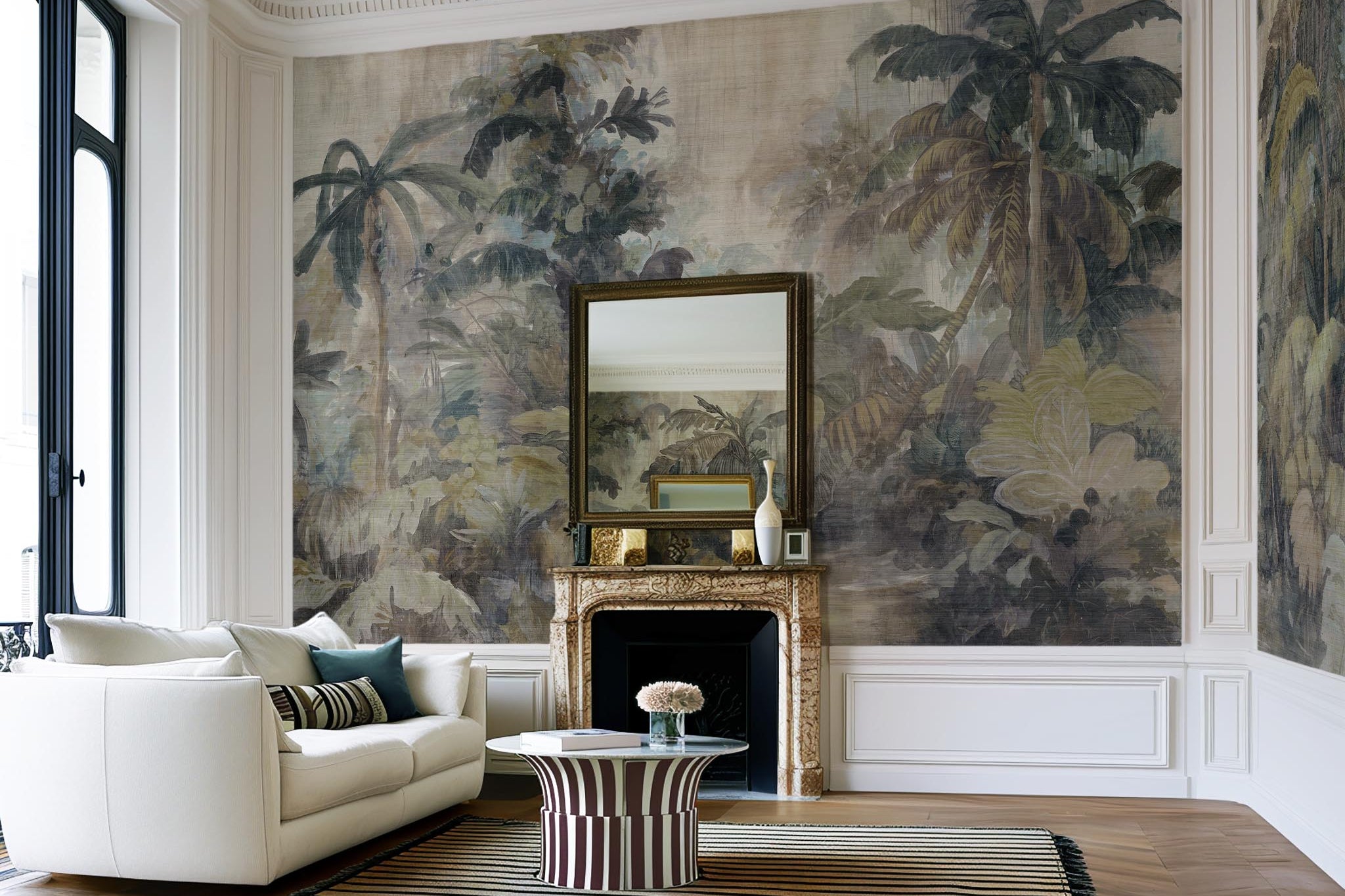 An interior living room featuring a panoramic grasscloth wallpaper mural of a tropical scene in sage and parchment.