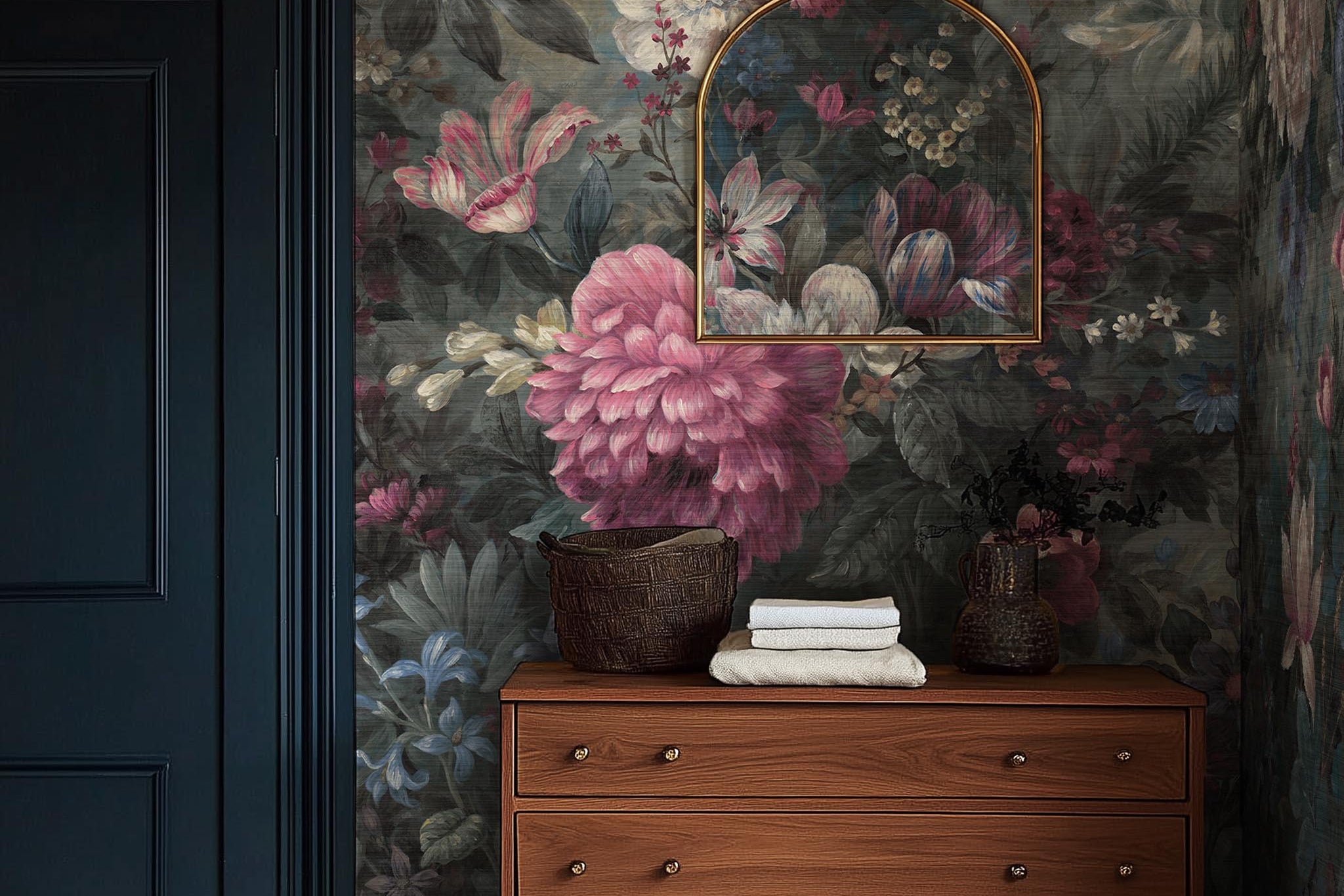 A cropped view of bedroom featuring a panoramic grasscloth wallpaper mural of a floral bloom in crimson and blue.