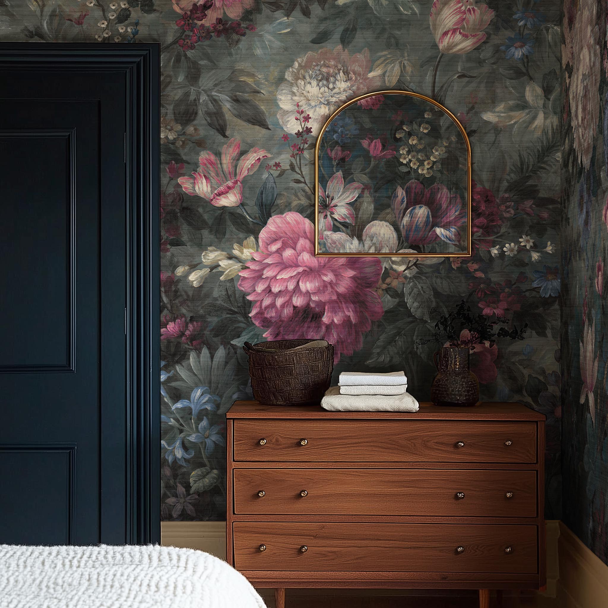A cropped view of bedroom featuring a panoramic grasscloth wallpaper mural of a floral bloom in crimson and blue.