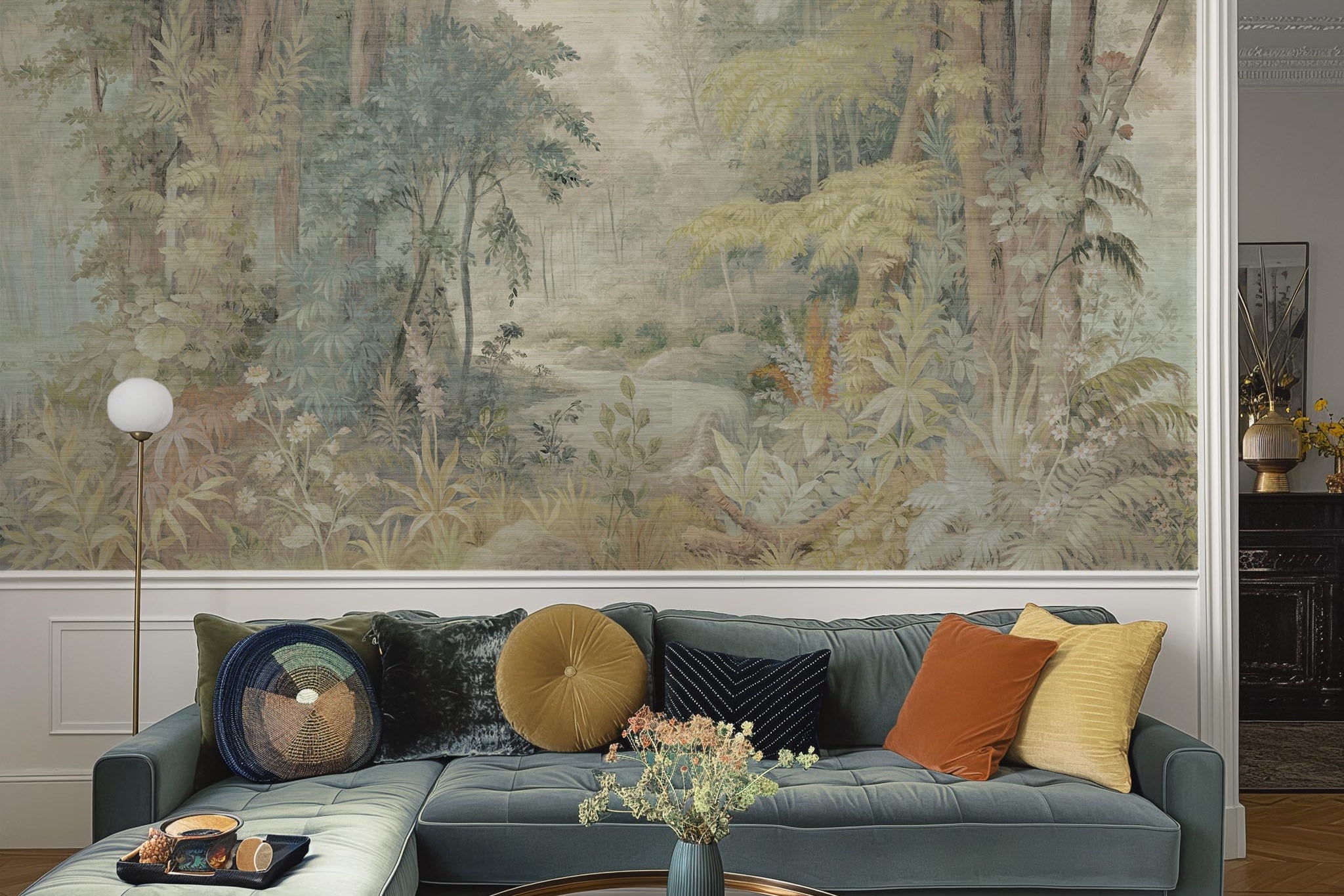 An interior living room featuring a panoramic grasscloth wallpaper mural of an airy woodland in sage, yellow, and mist.