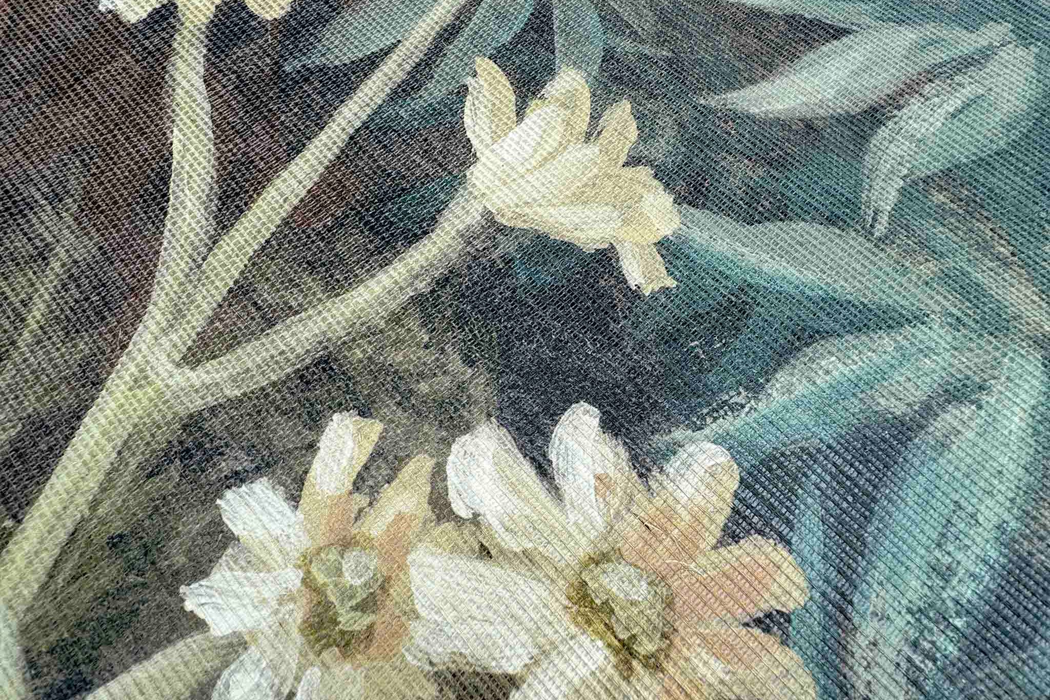 Close-up of a floral designer mural on grasscloth, featuring soft white flowers against a muted, textural background.