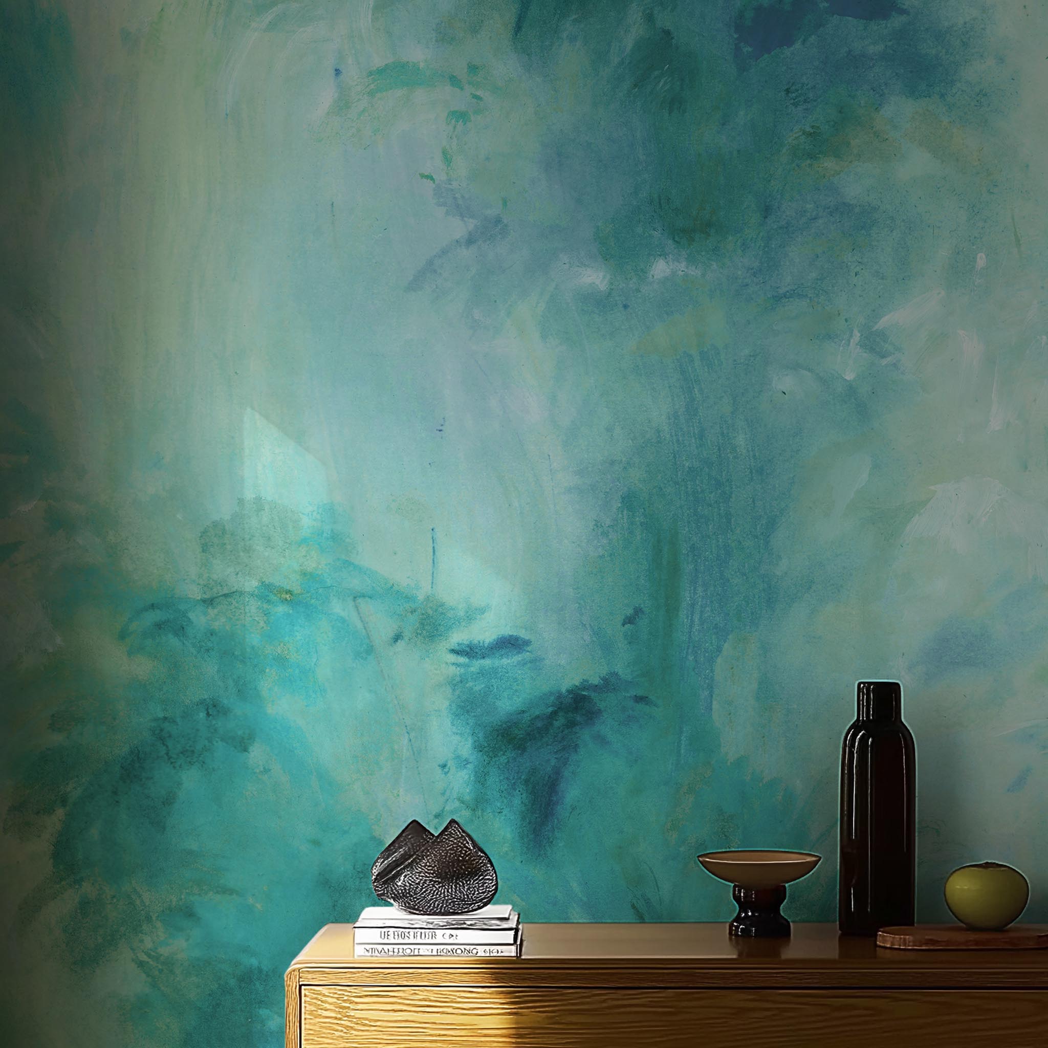 A cropped view of living room featuring a panoramic matte wallpaper mural of an abstract wash in aqua and jade.