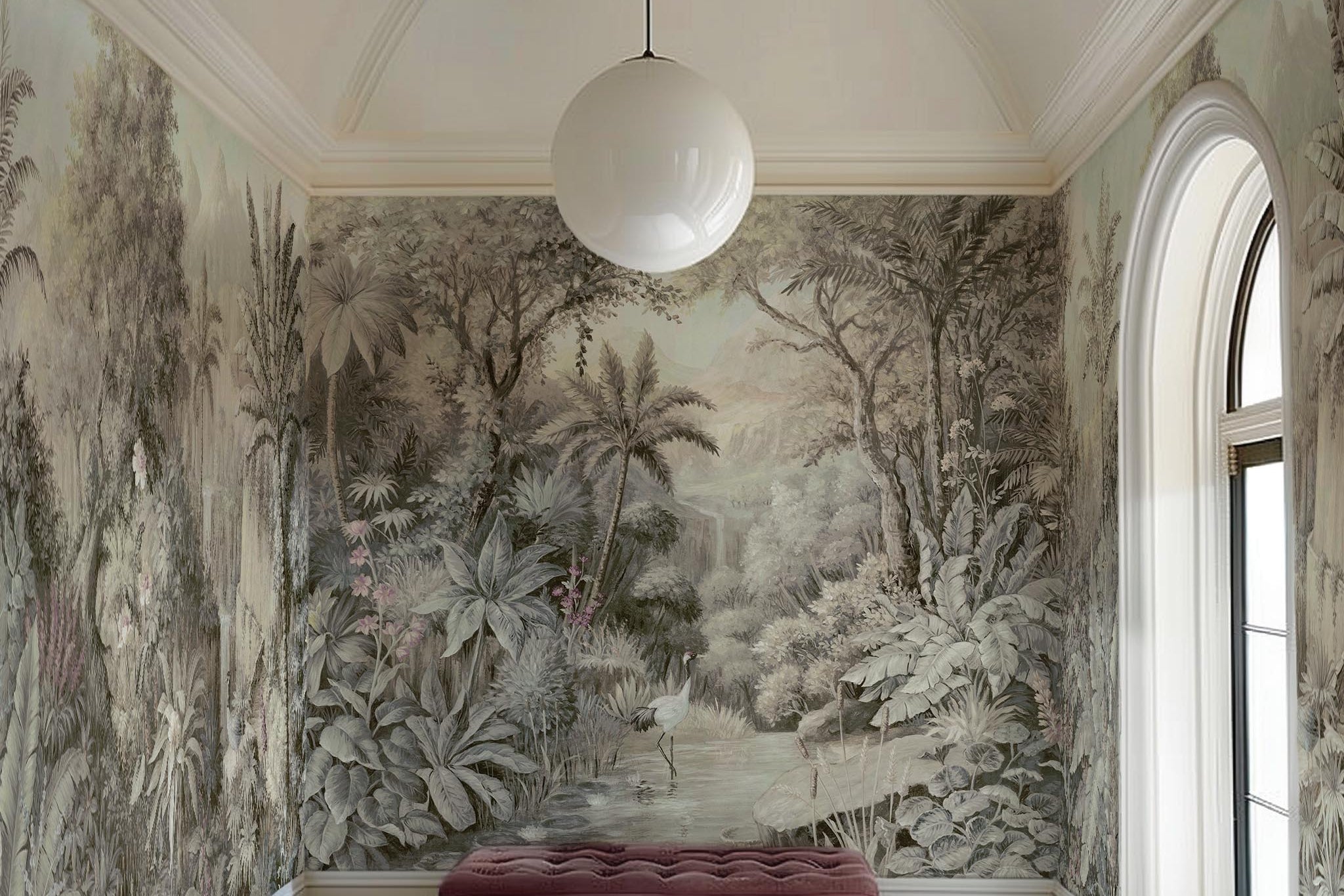 An interior sitting area featuring a panoramic vinyl wallpaper mural of a jungle vista in sepia and blush.