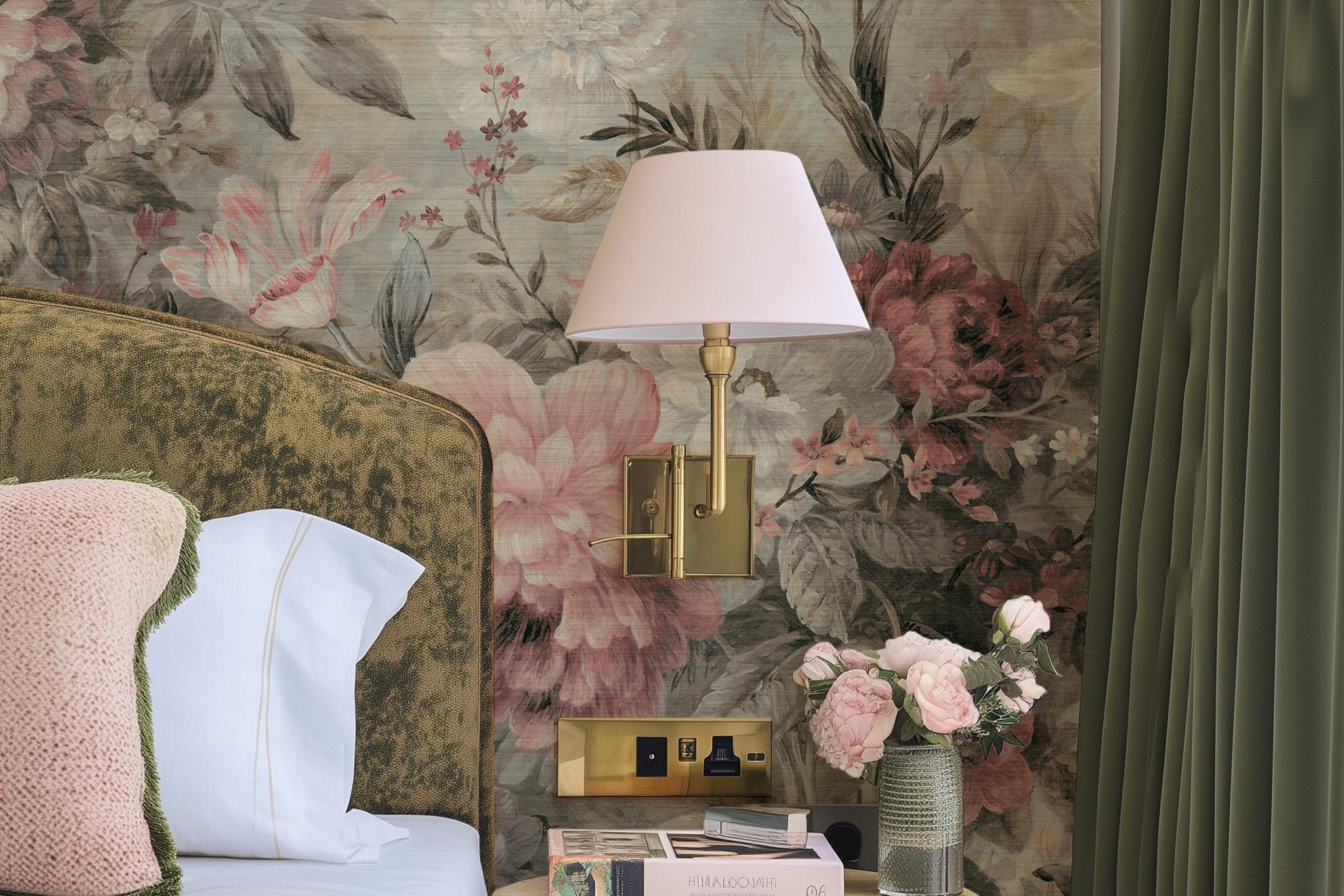 A cropped view of bedroom featuring a panoramic grasscloth wallpaper mural of a floral composition in soft neutrals.