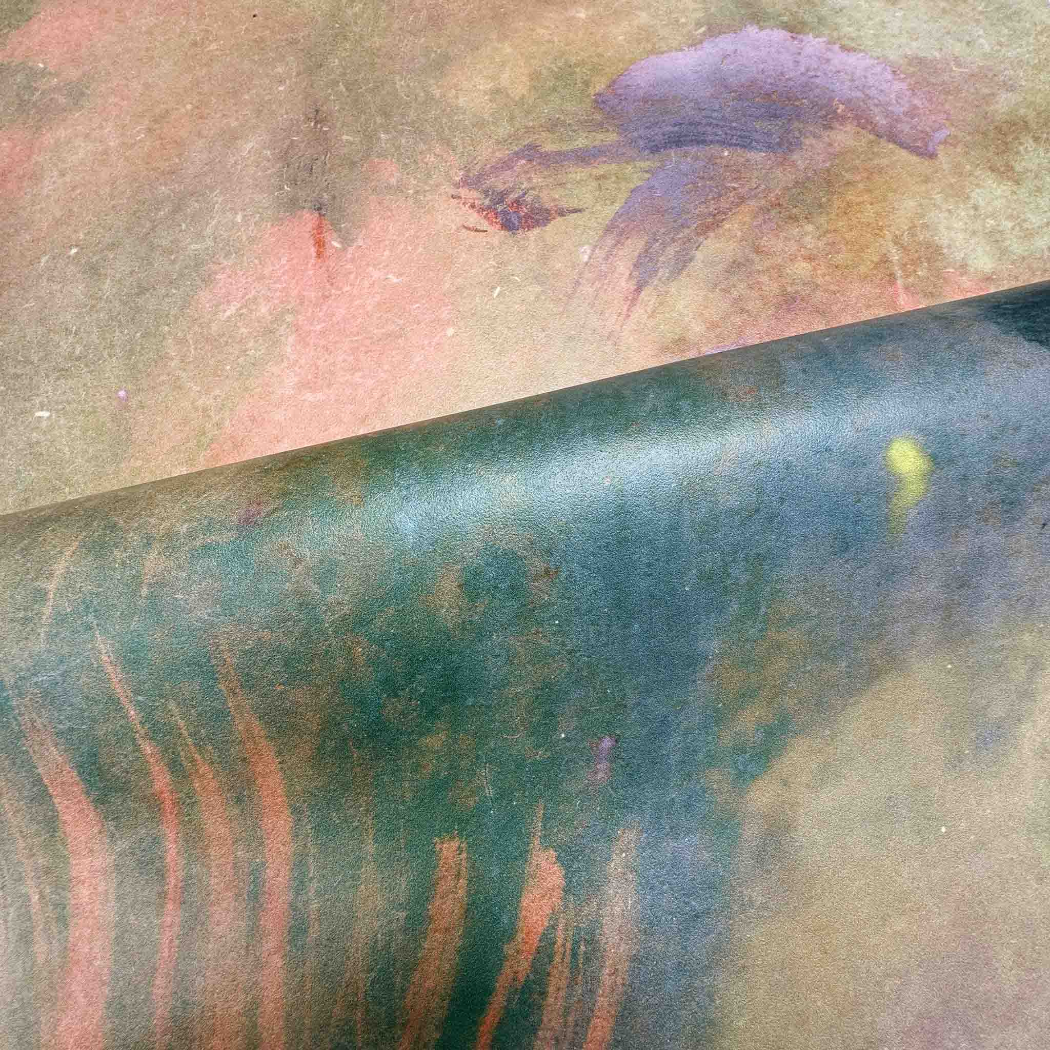 Close-up of a hand-painted panoramic wallpaper mural featuring warm ember reds and deep greens on a durable vinyl.