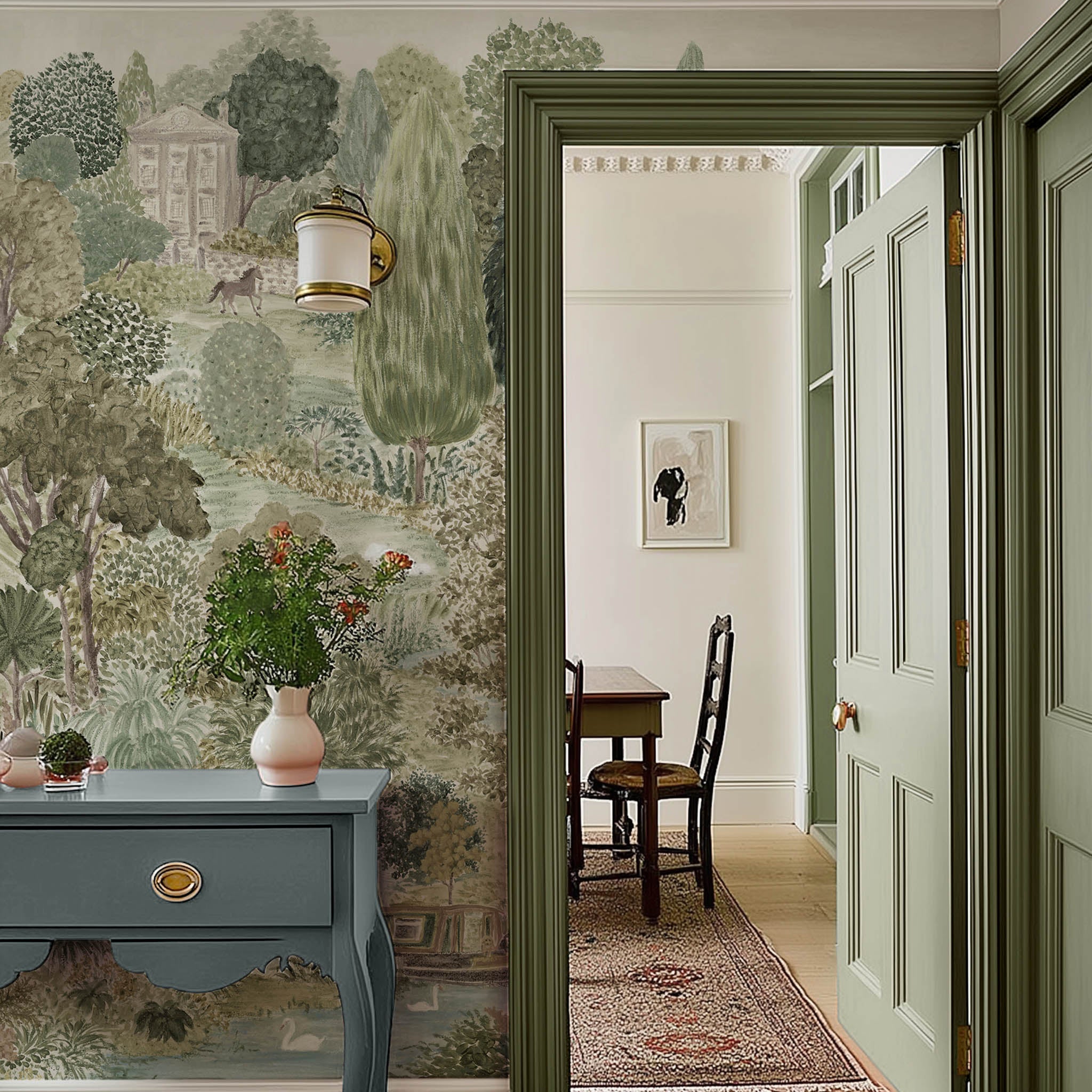 An interior hallway featuring a panoramic matte wallpaper mural of soft green countryside with cattle and boats