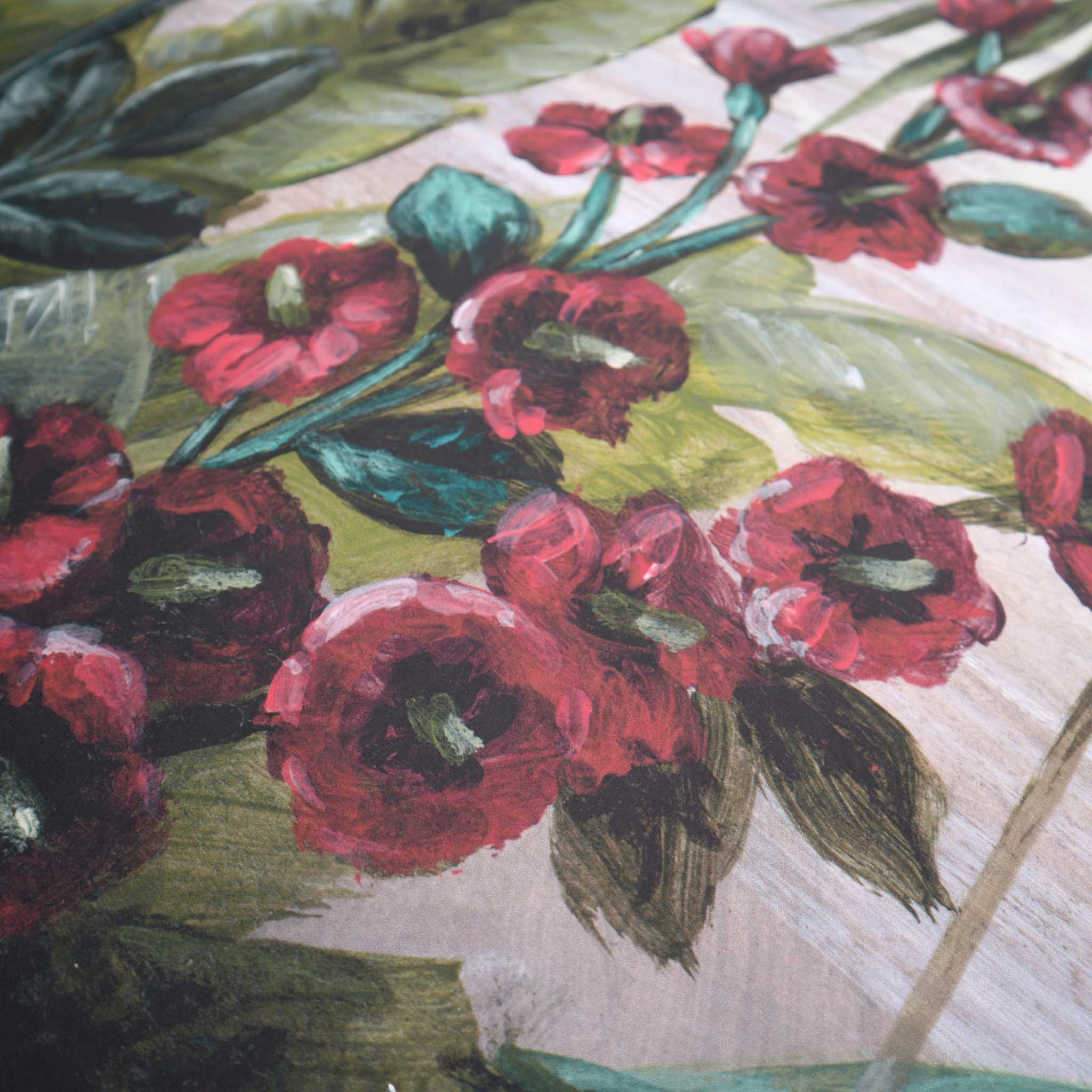 Close-up of a hand-painted wallpaper mural featuring vibrant red flowers and green leaves on a matte finish.