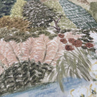 A close up view showing the detail of a matte wallpaper mural which features soft green countryside with cattle and boats