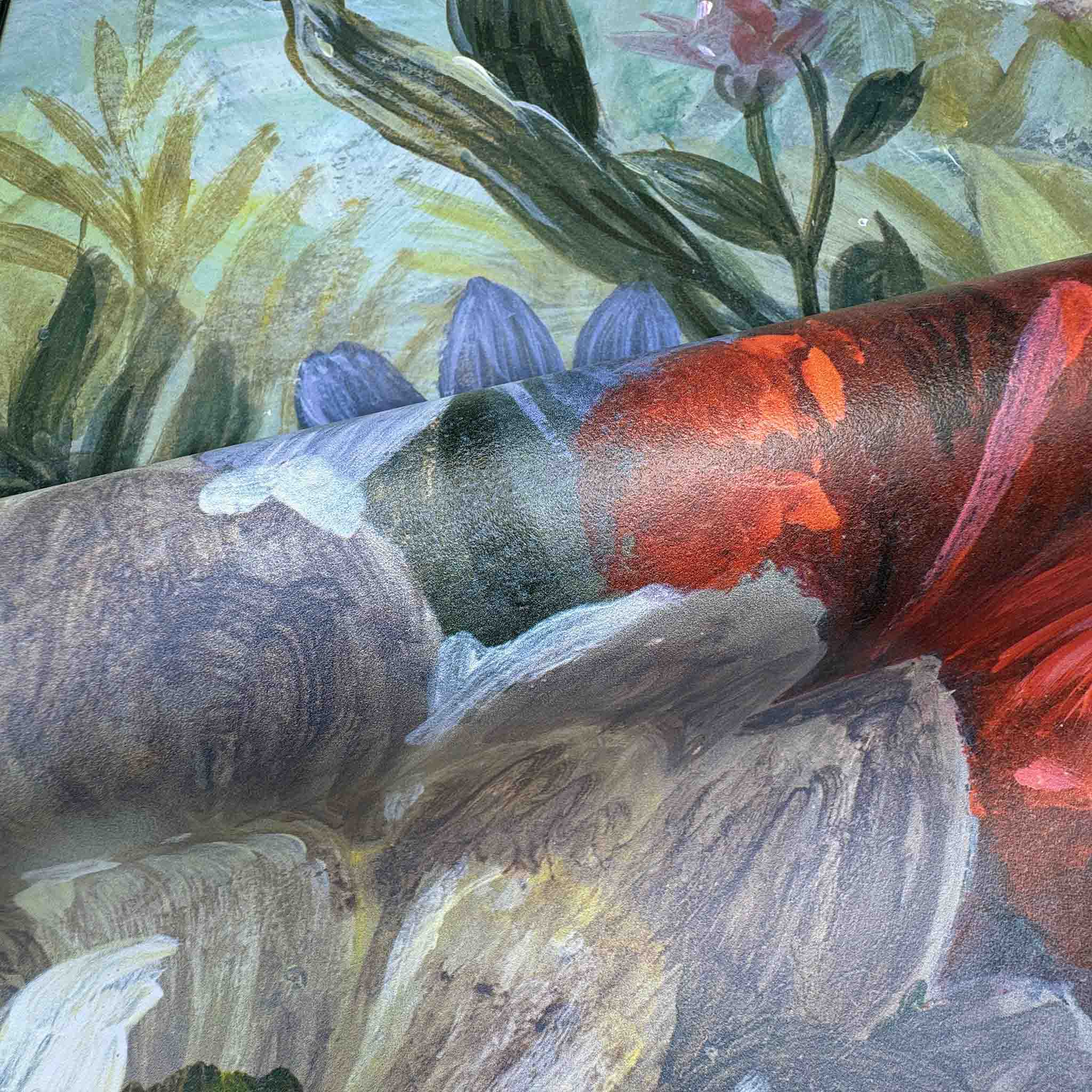 Close-up of a bespoke floral mural wallpaper featuring vibrant greens, reds, purples, and soft pinks on washable vinyl.