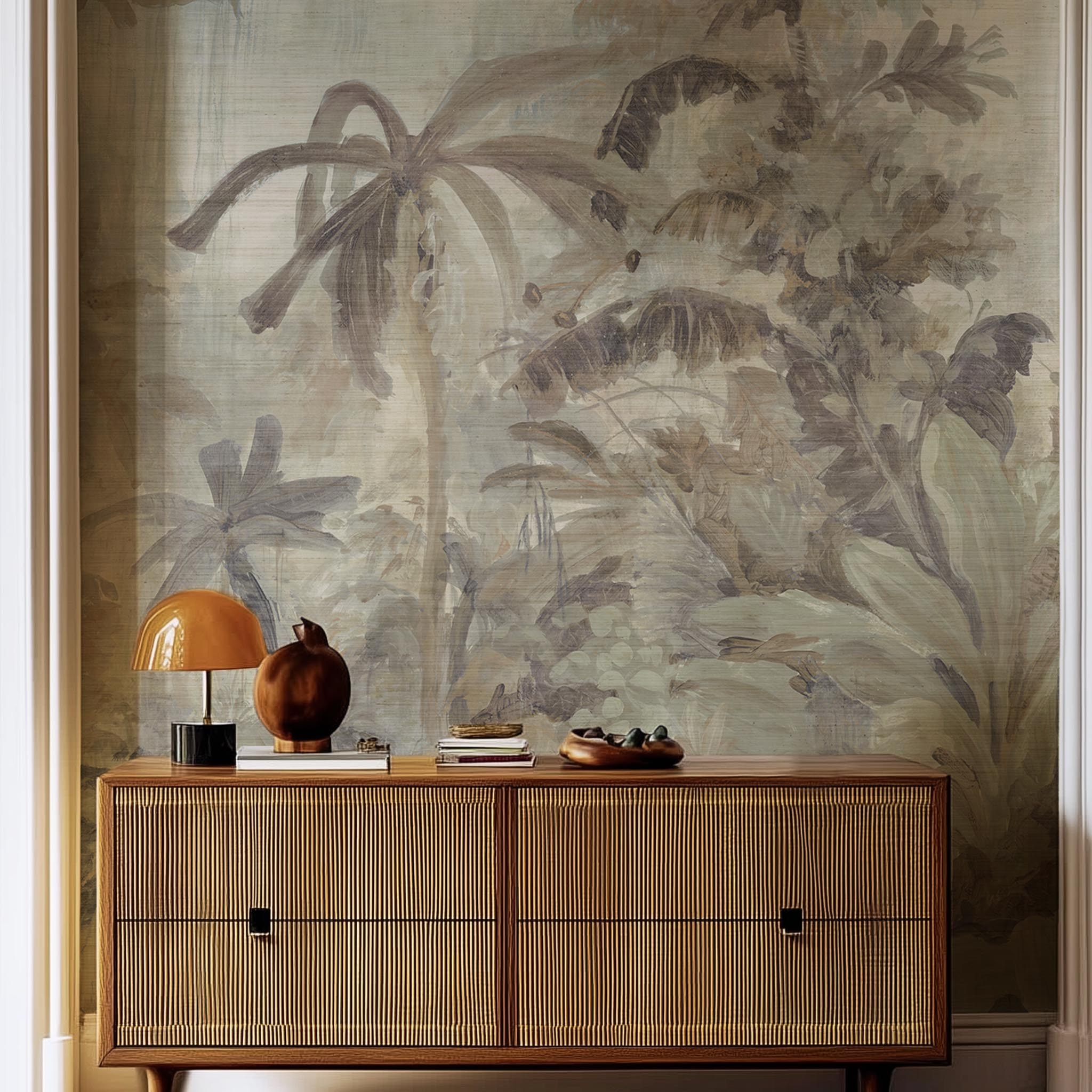 A cropped view of living room featuring a panoramic grasscloth wallpaper mural of a jungle scene in sepia and blue.