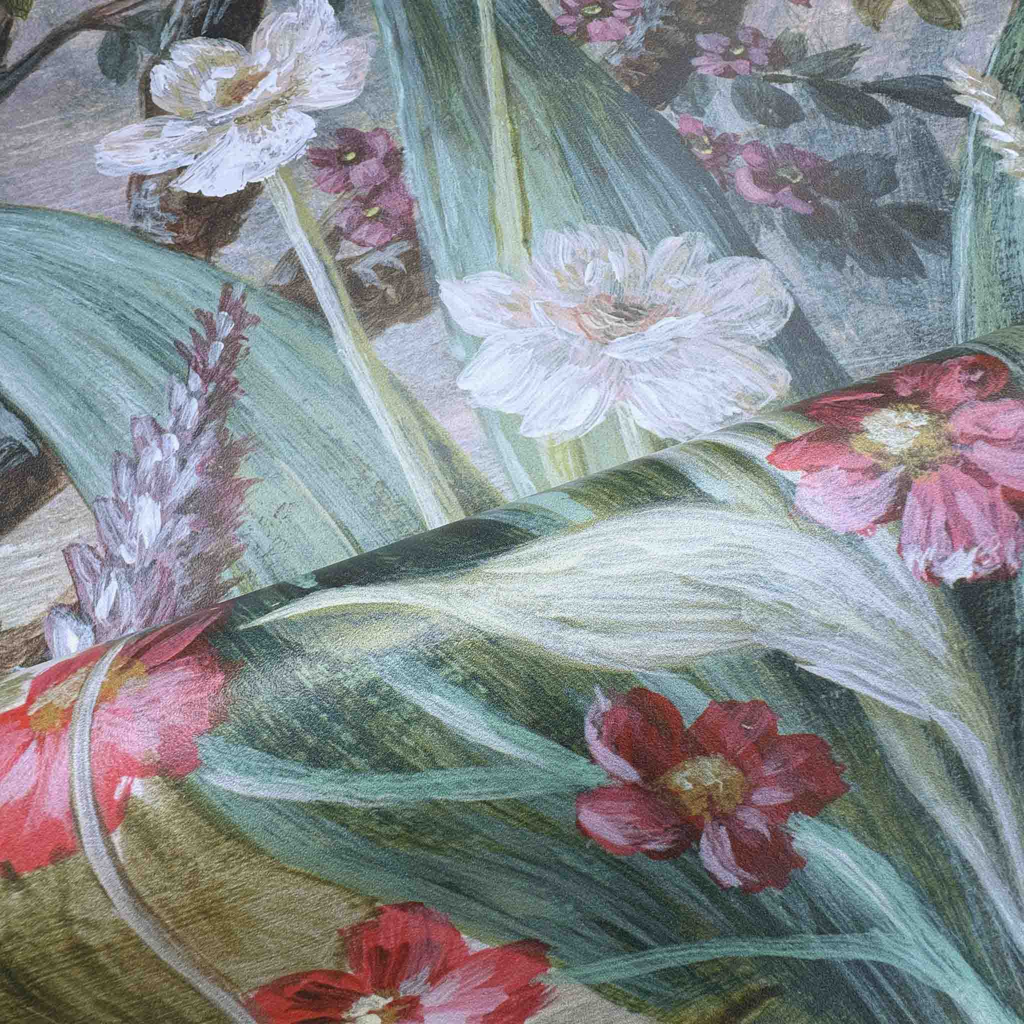 Close-up of a bespoke floral wallpaper mural featuring rich greens, bright pinks, and soft blues on durable vinyl.
