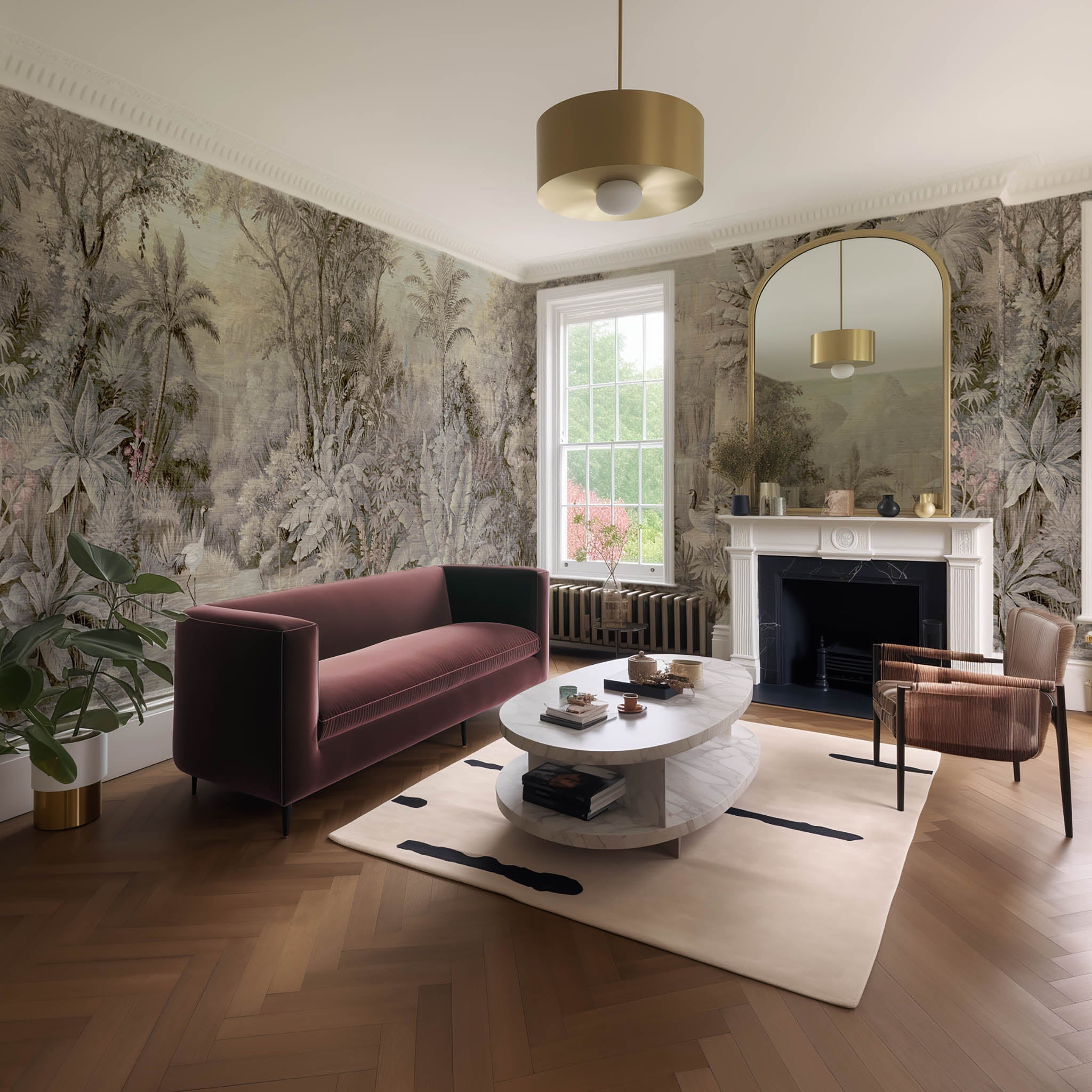 An interior living room featuring a panoramic grasscloth wallpaper mural of a jungle vista in sepia and blush.