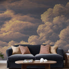 An interiorliving room featuring a panoramic matte wallpaper mural of warm peach clouds