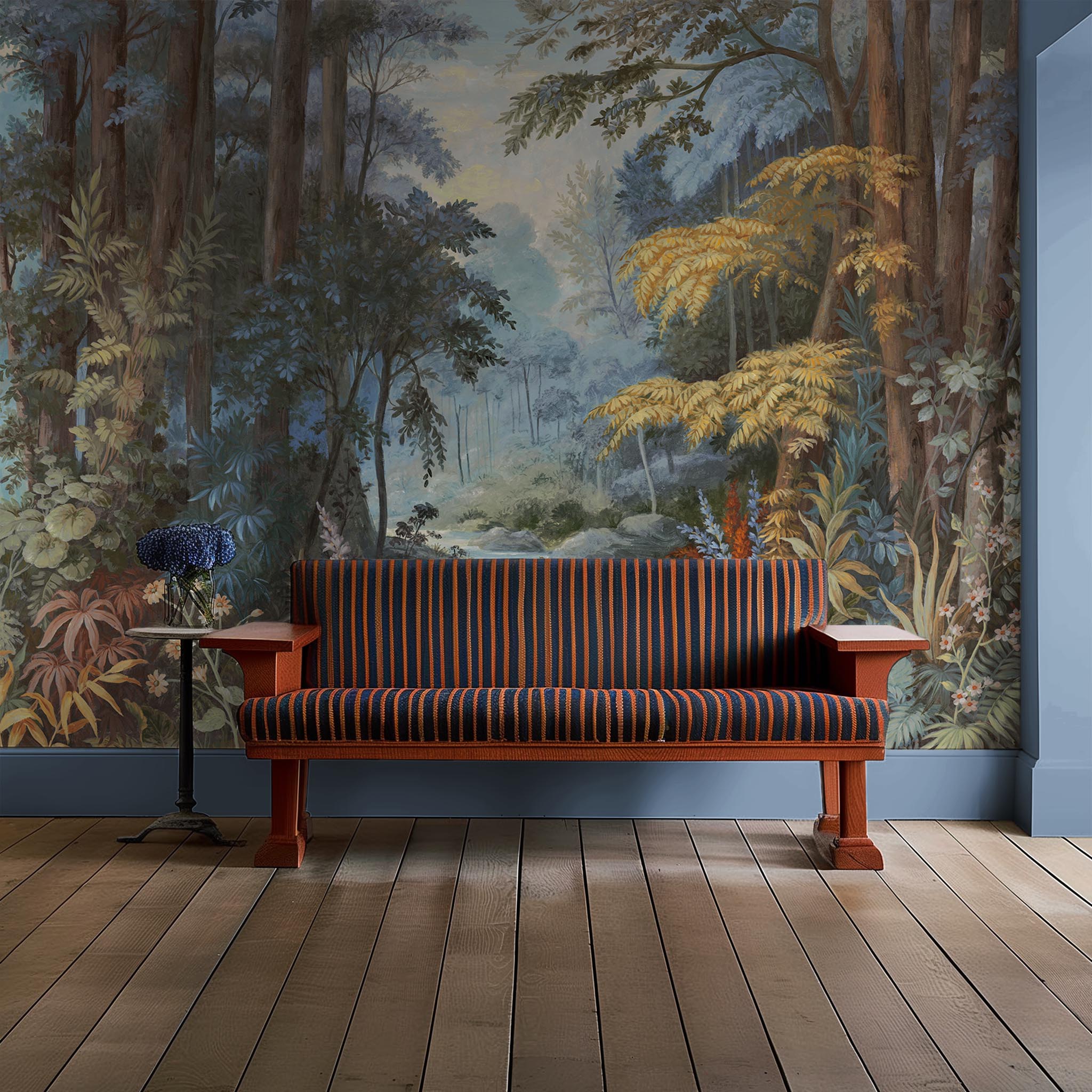 An interior sitting area featuring a panoramic matte wallpaper mural of an enchanted forest in blue and rust.
