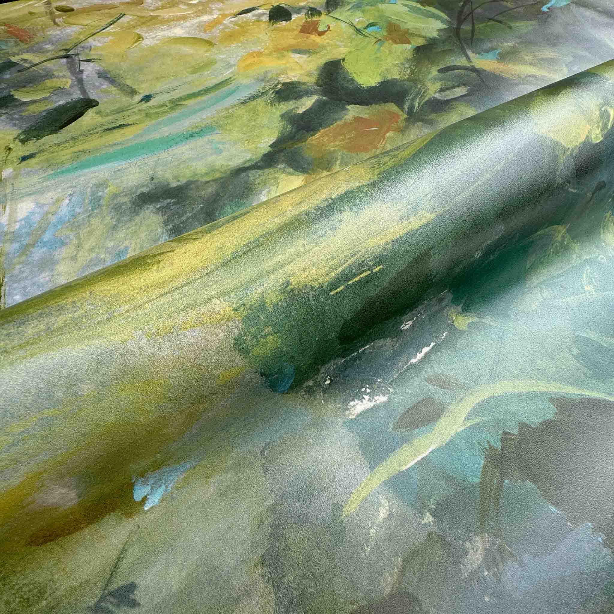 Close-up of a bespoke panoramic wallpaper mural featuring vibrant greens and golds, evoking a lush jungle landscape.