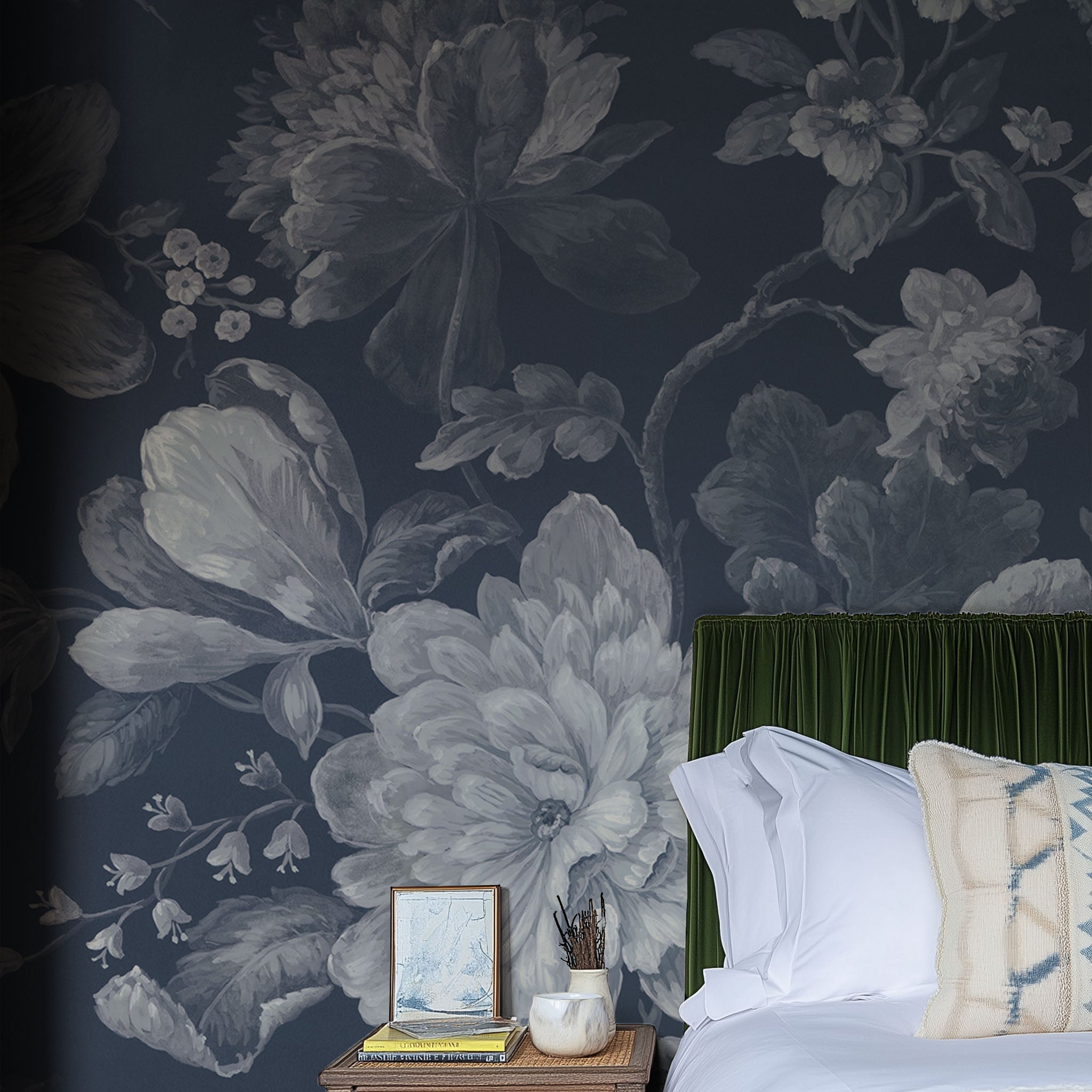 A cropped view of bedroom featuring a panoramic matte wallpaper mural of moonlit florals on deep navy