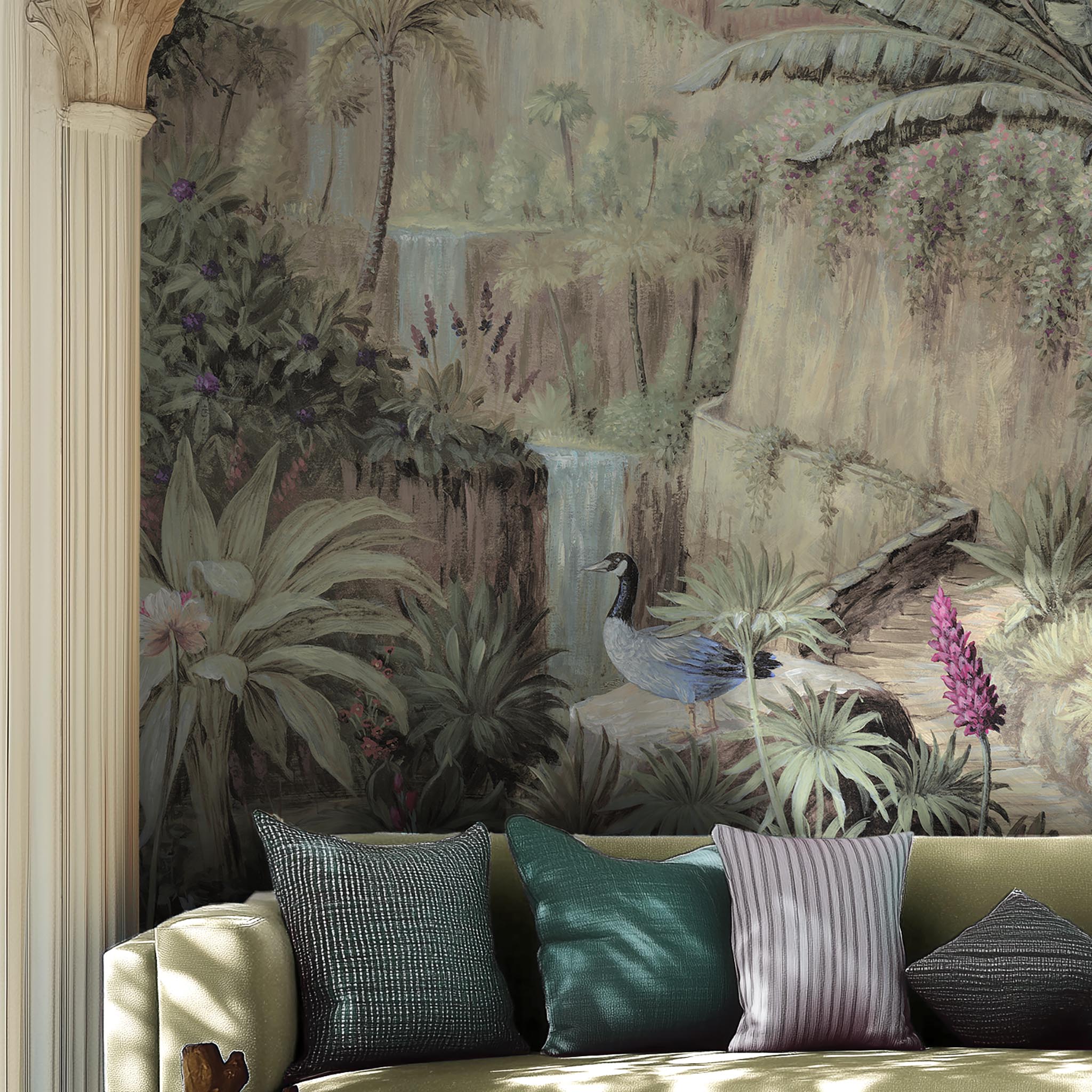 A cropped view of living room featuring a panoramic vinyl wallpaper mural of a tropical paradise in cool greens and blushes.