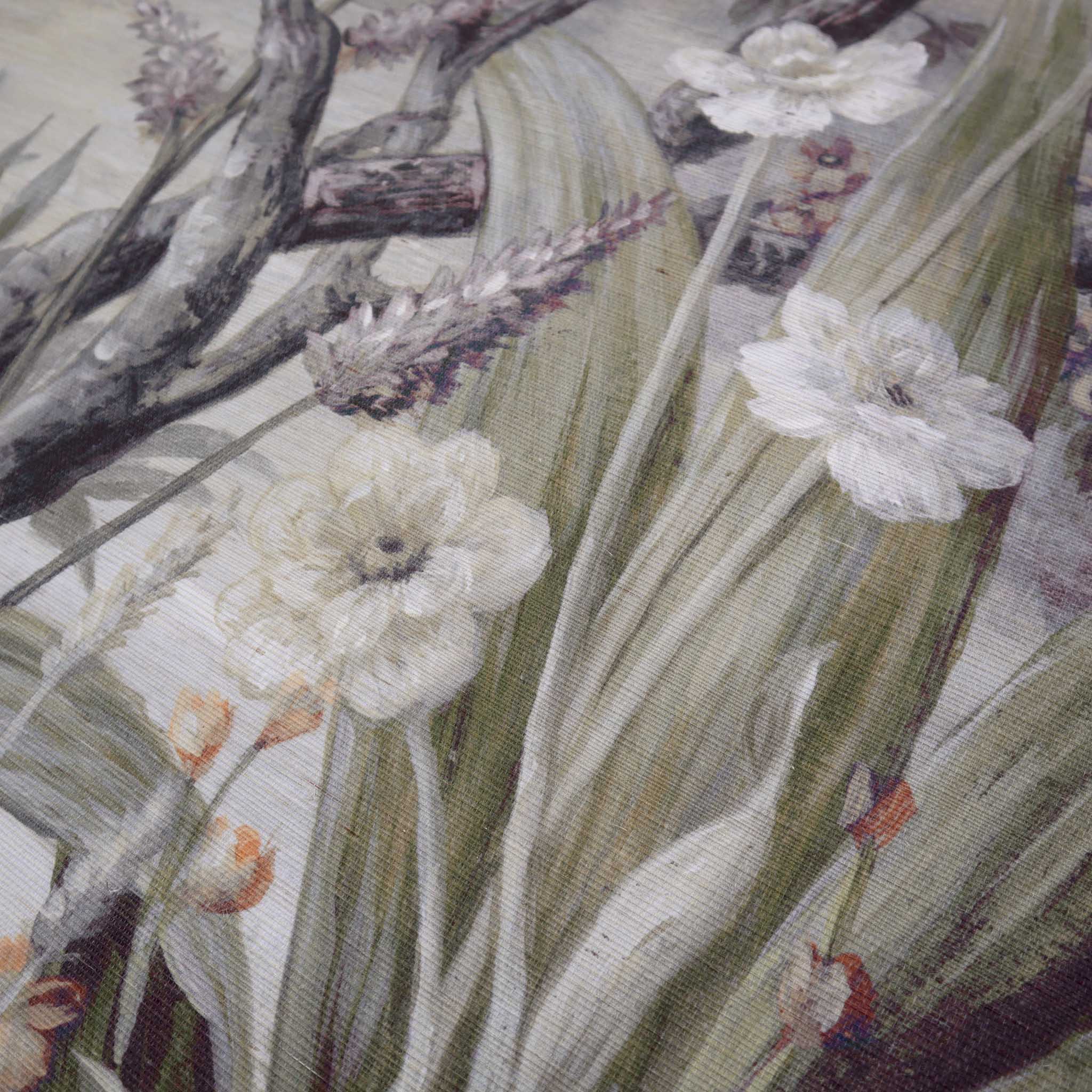 Close-up of a hand-painted grasscloth wallpaper mural with subtle tones of white, green, and pink evoking chinoiserie.