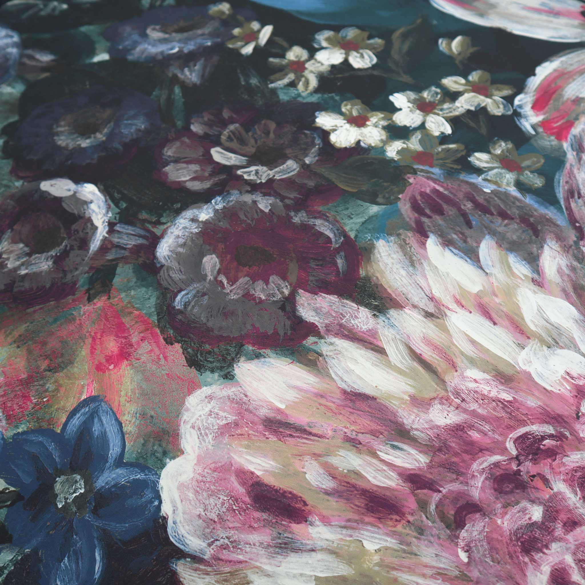Close-up of a moody floral mural, featuring jewel tones and soft blooms on a matte uncoated substrate.