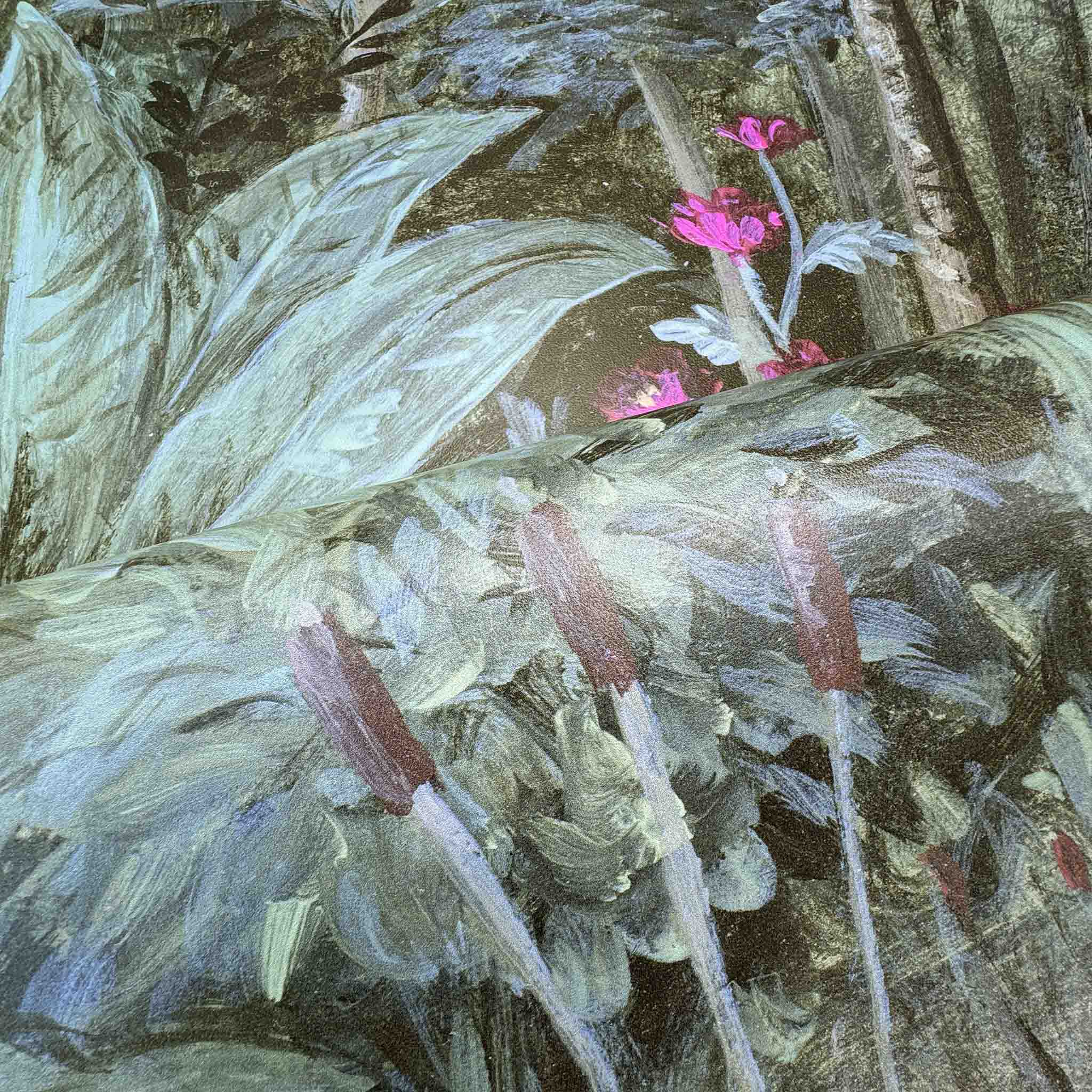 Close-up of a bespoke tropical mural featuring lush green foliage and vibrant pink flowers, printed on durable vinyl.