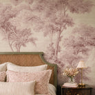 A cropped view of a bedroom featuring a panoramic grasscloth wallpaper mural of rose forest