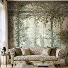 A cropped view of a living room featuring a panoramic pearlescent wallpaper mural of sunlit conservatory mural in chamomile & sage tones