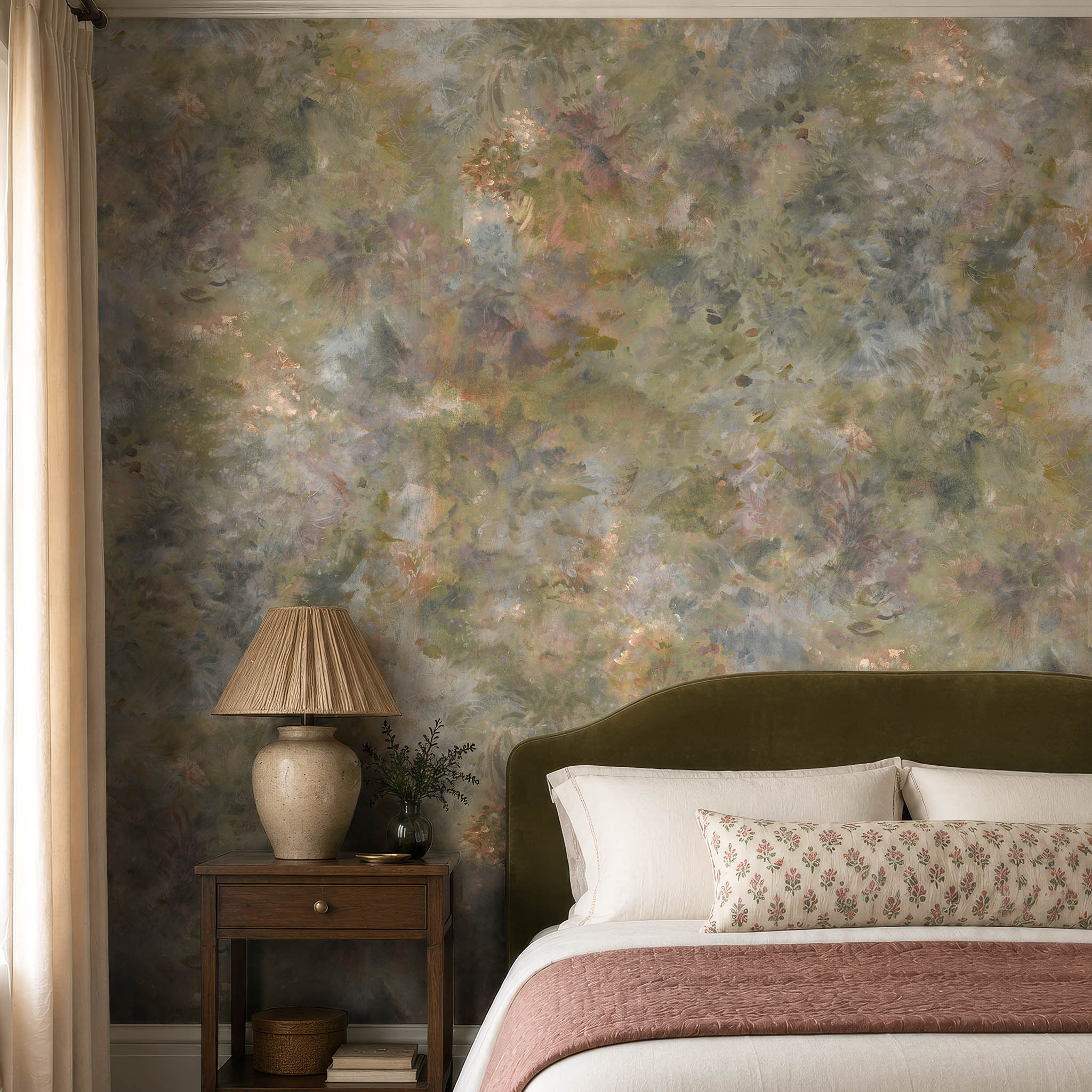 A cropped view of a bedroom featuring a panoramic pearlescent wallpaper mural of muted botanical interior mural in shadow.